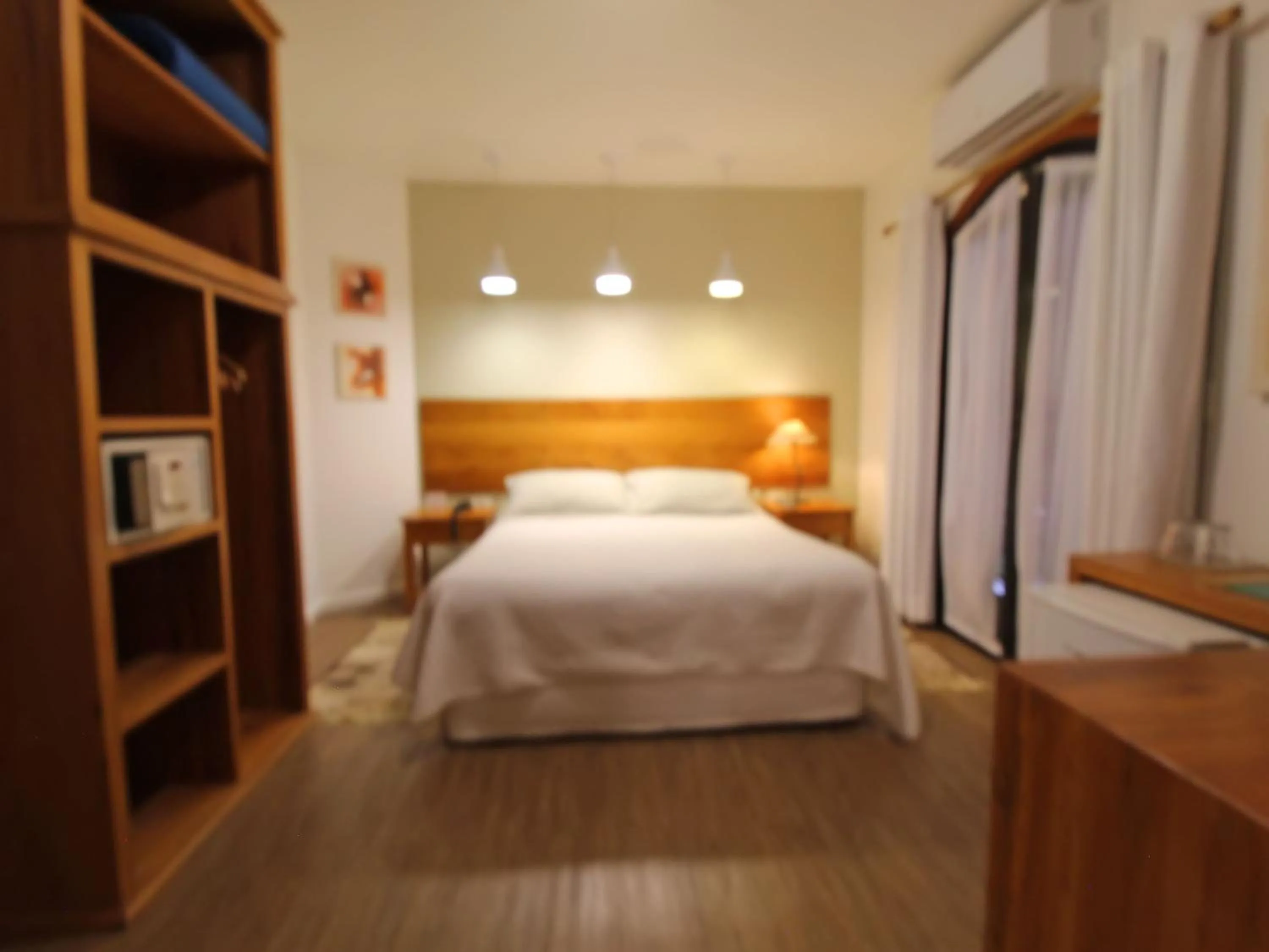 Bed in Pousada Villa Capivary Campos do Jordão