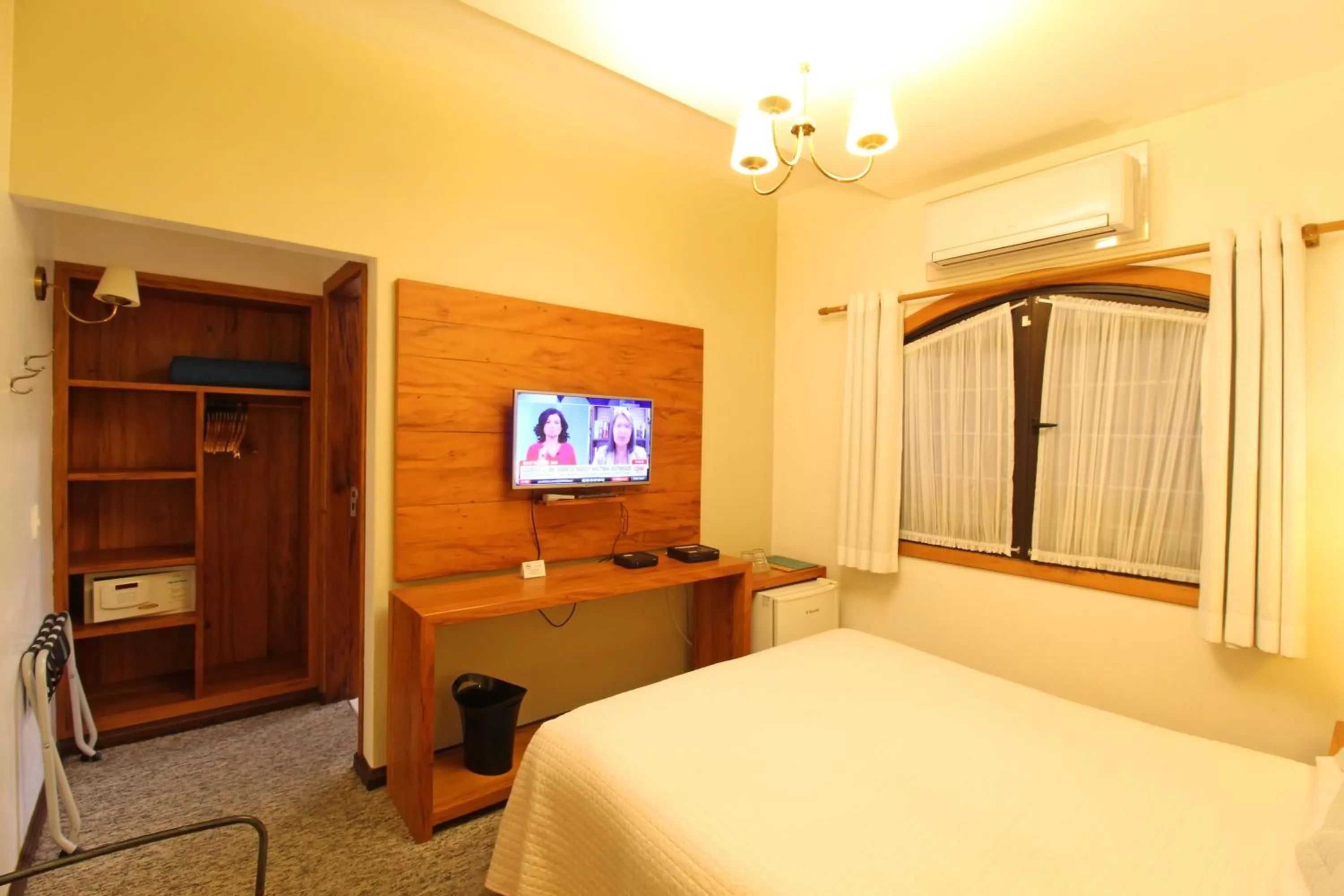 TV and multimedia, Bed in Pousada Villa Capivary Campos do Jordão