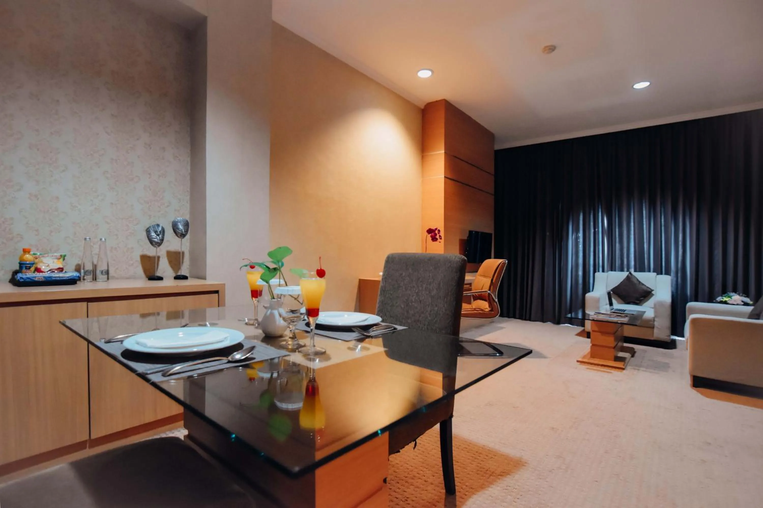 Living room in Surabaya Suites Hotel Powered by Archipelago