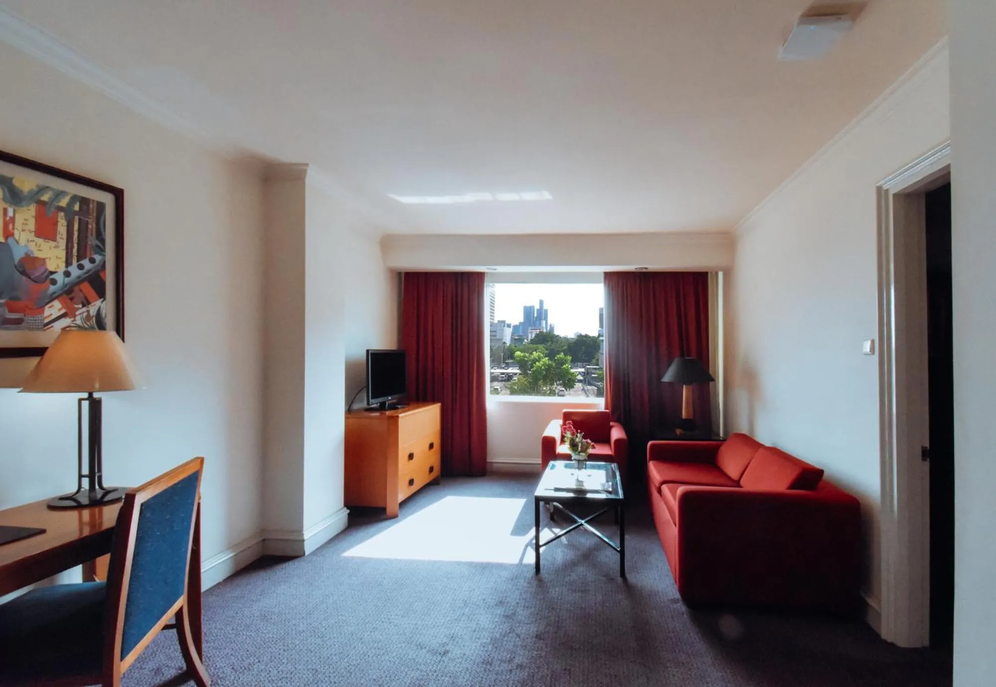 Seating area in Surabaya Suites Hotel Powered by Archipelago