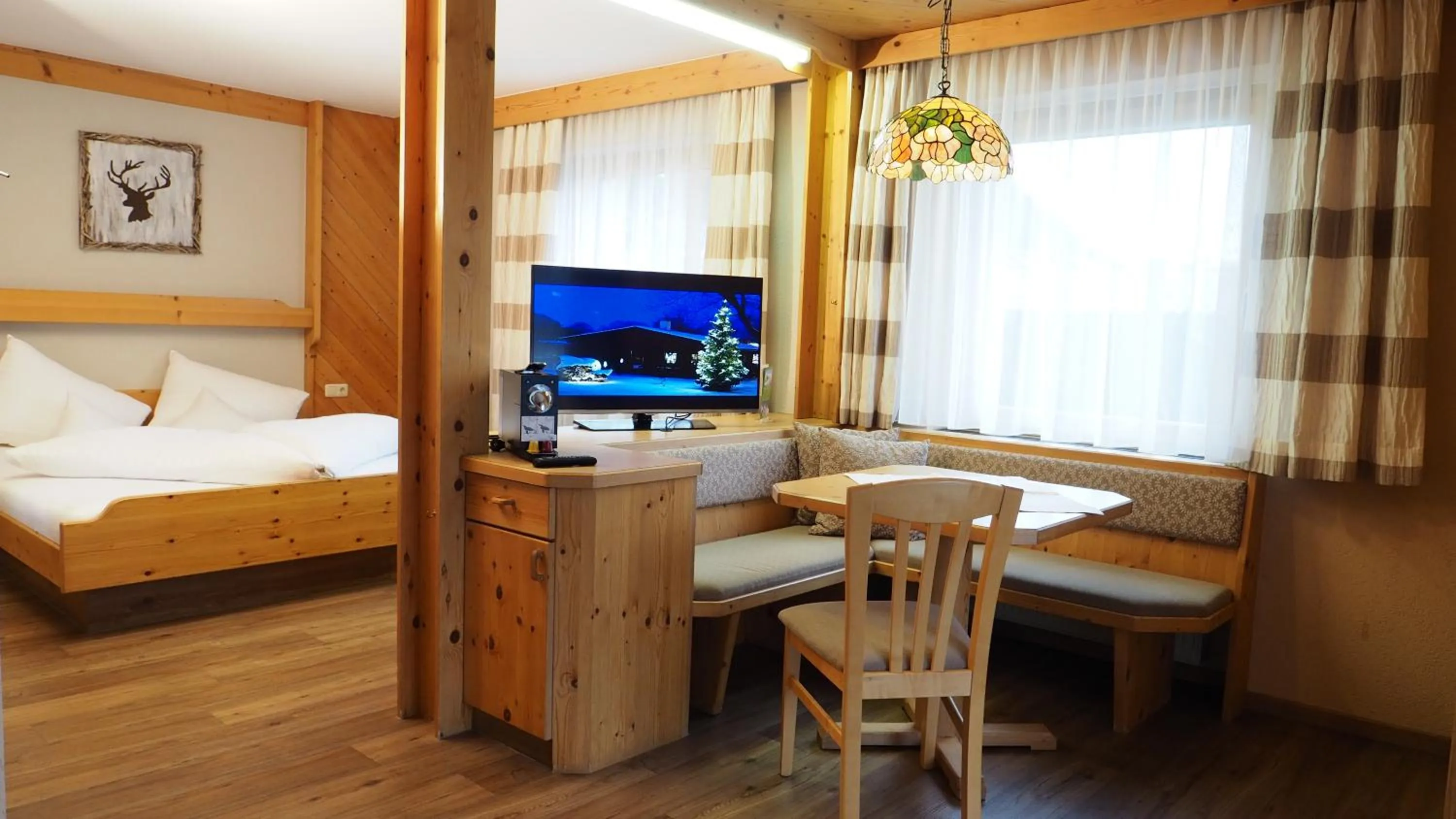 Seating area, Bed in Frühstückshotel Margret