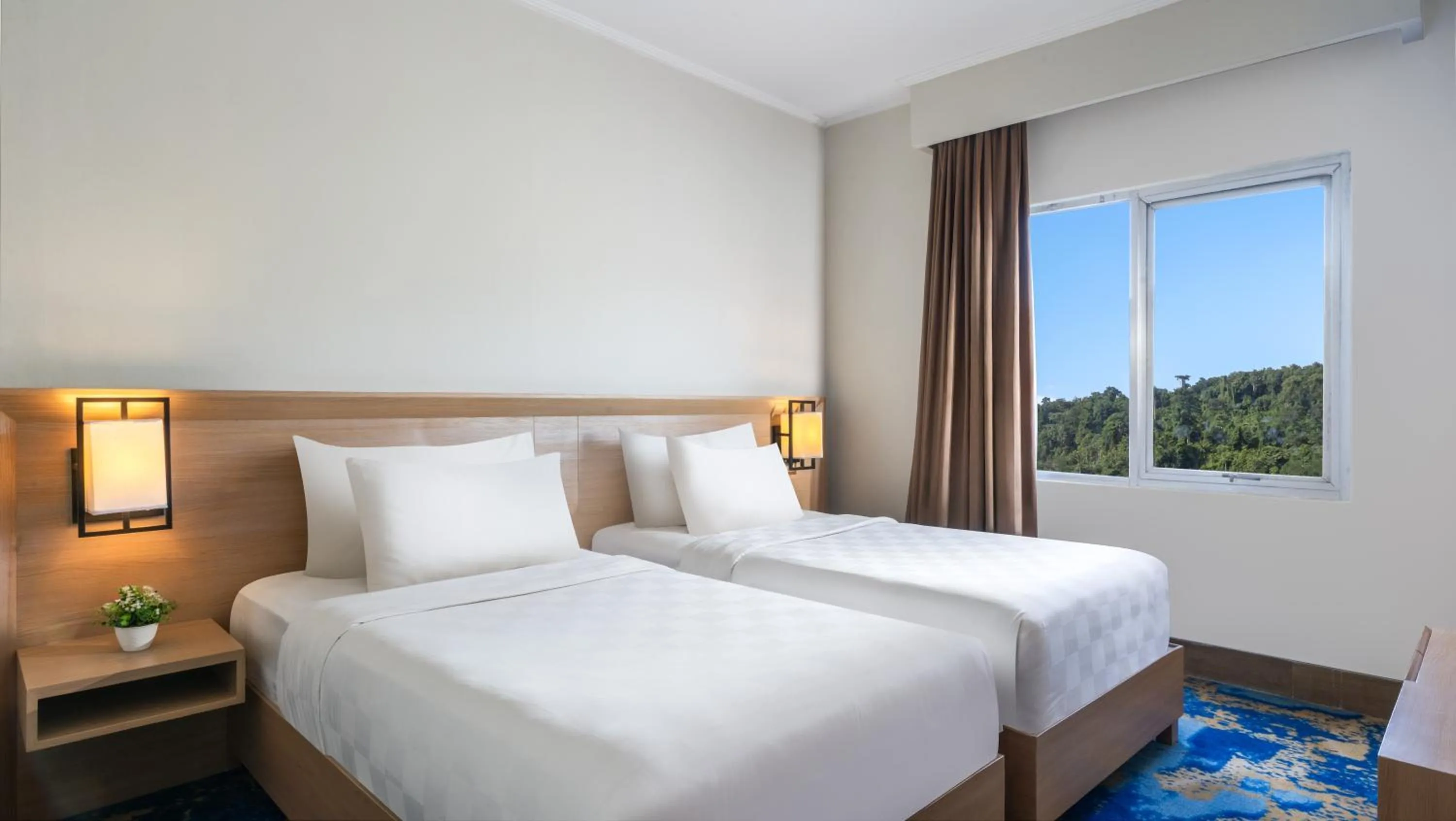 Bed in Swiss-Belhotel Manokwari