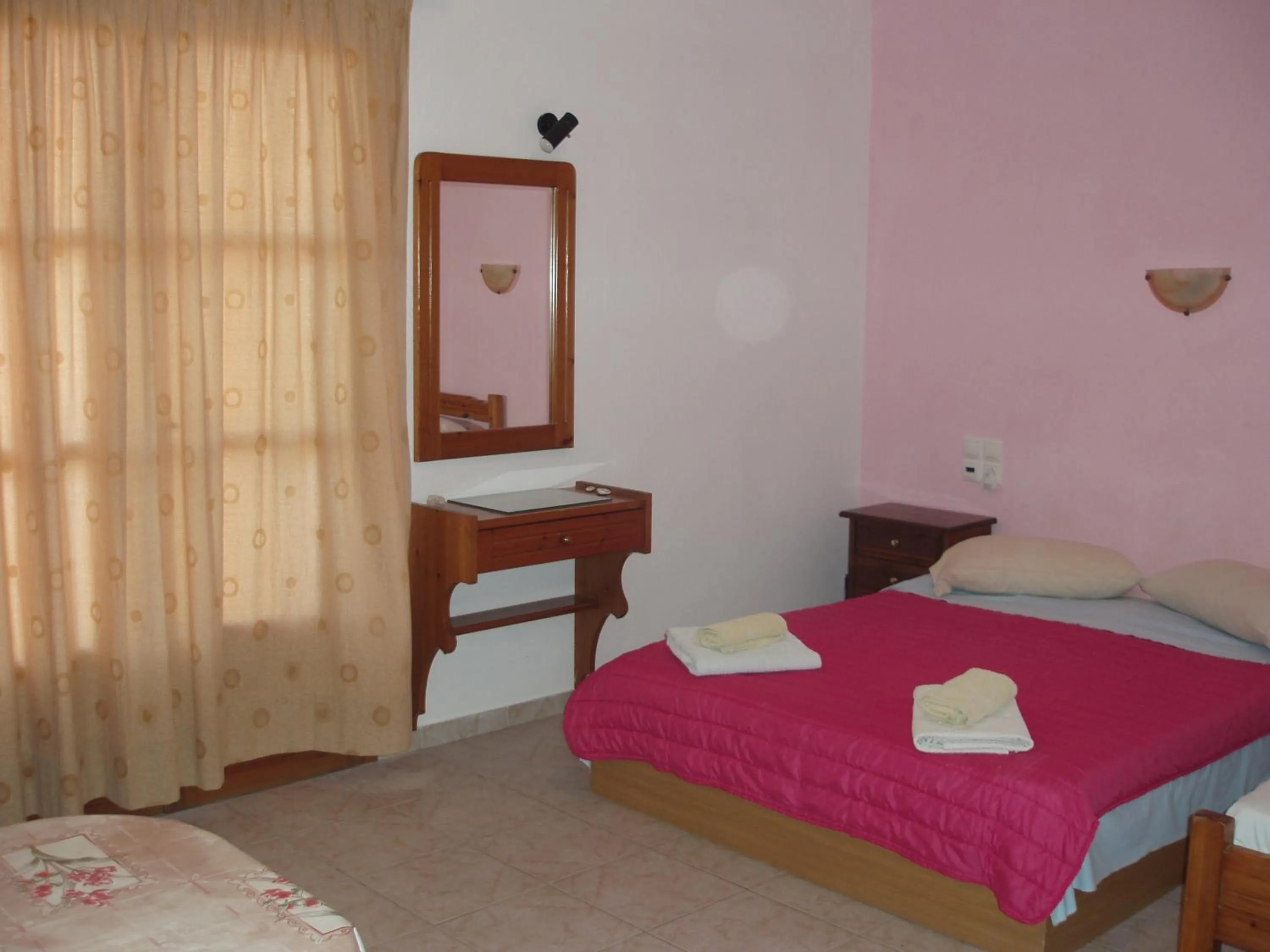 Photo of the whole room, Bed in Hellen Studios