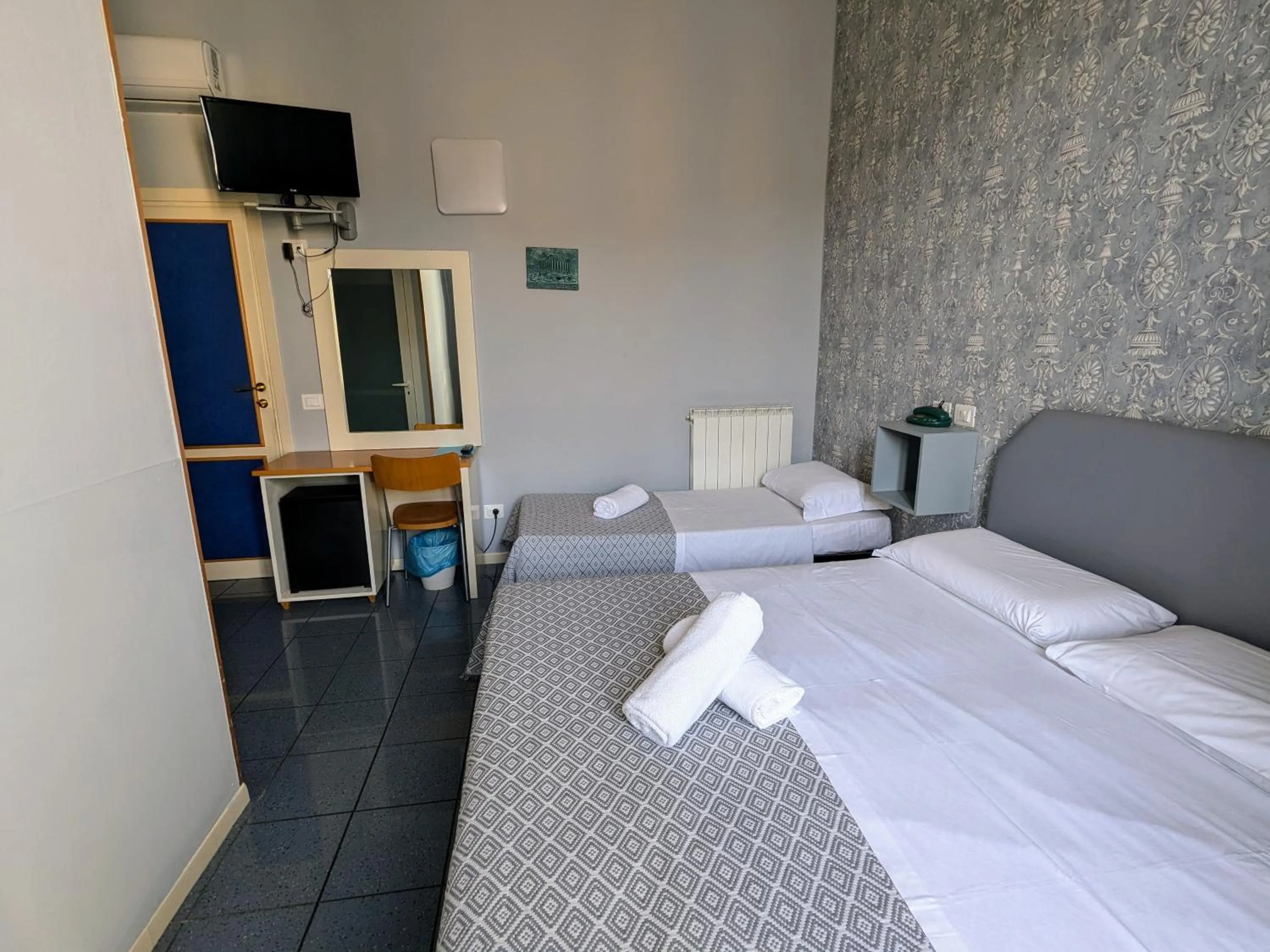 Bed in Hotel Soggiorno Athena