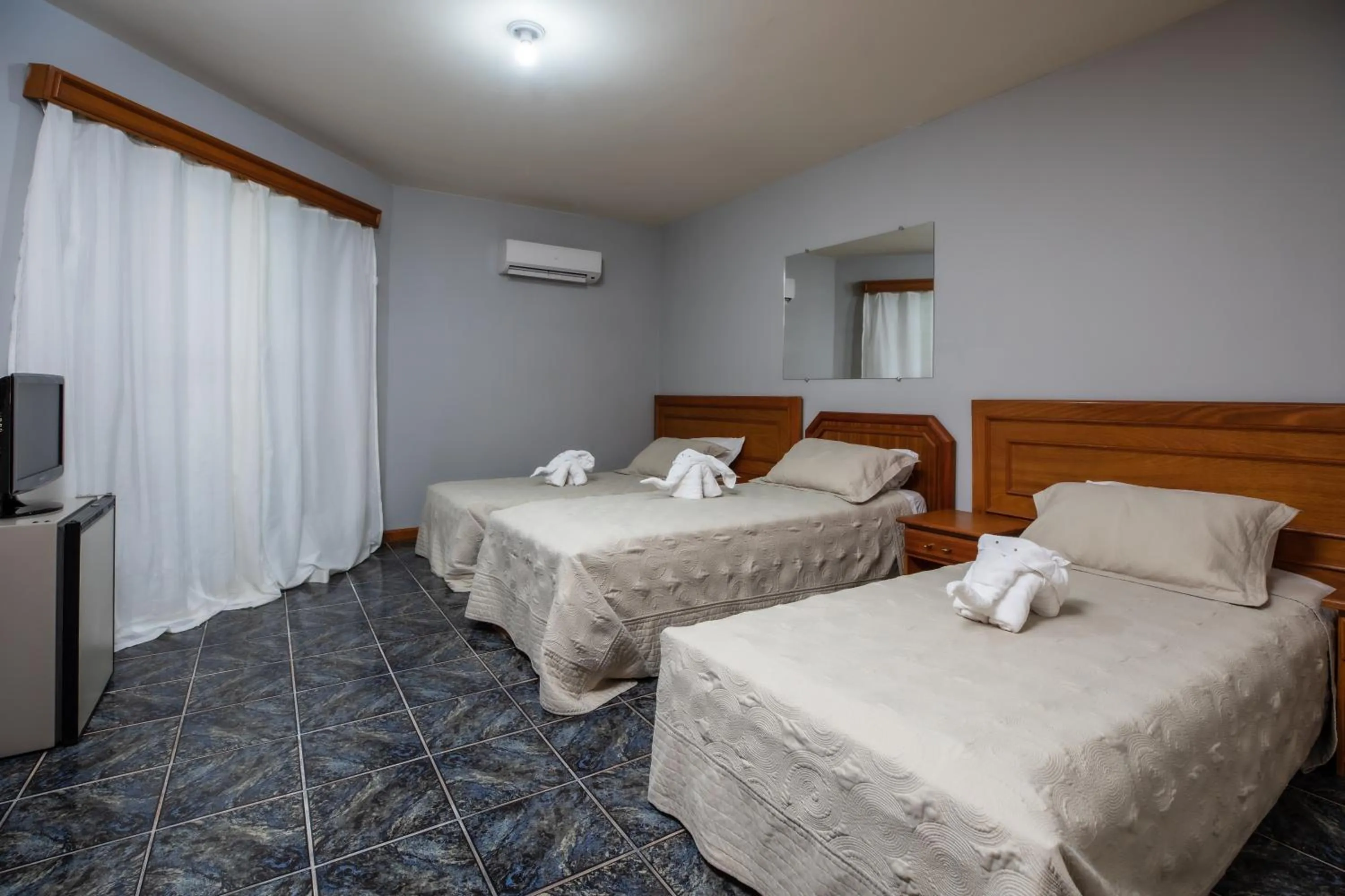 Bed in Canzi Cataratas Hotel