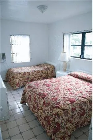 Bed in Napoli Belmar Resort