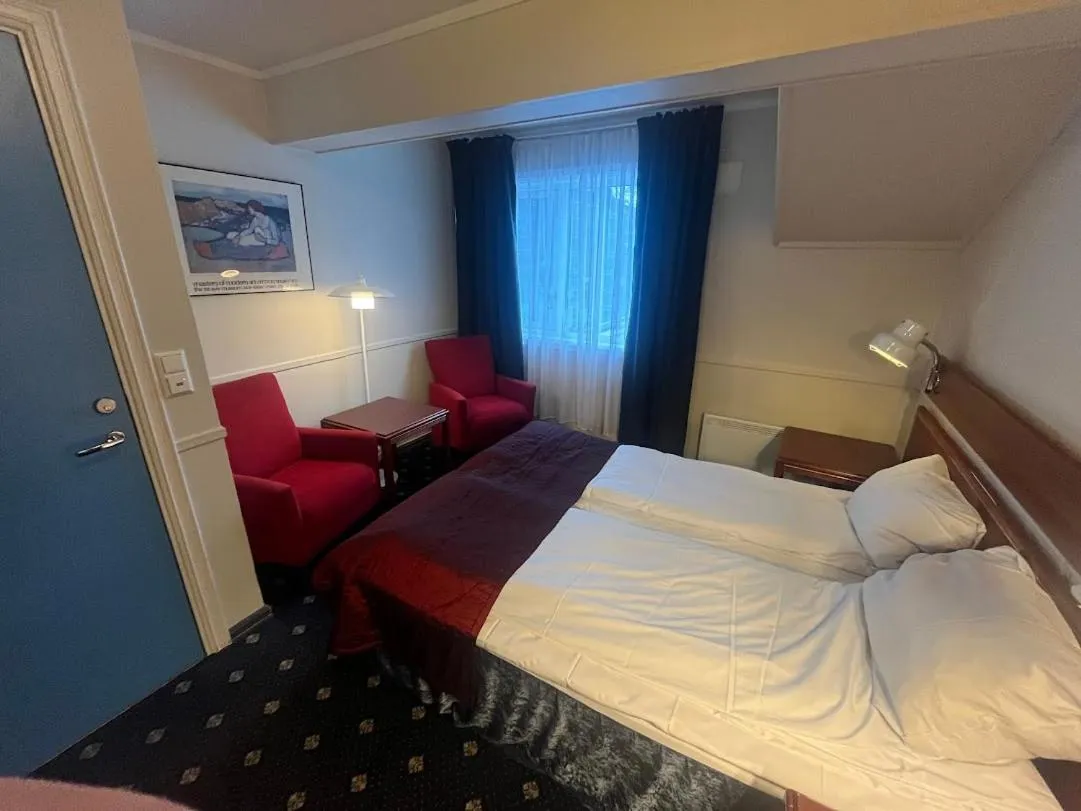 Bed in Welcome Inn Hotel Lyngskroa