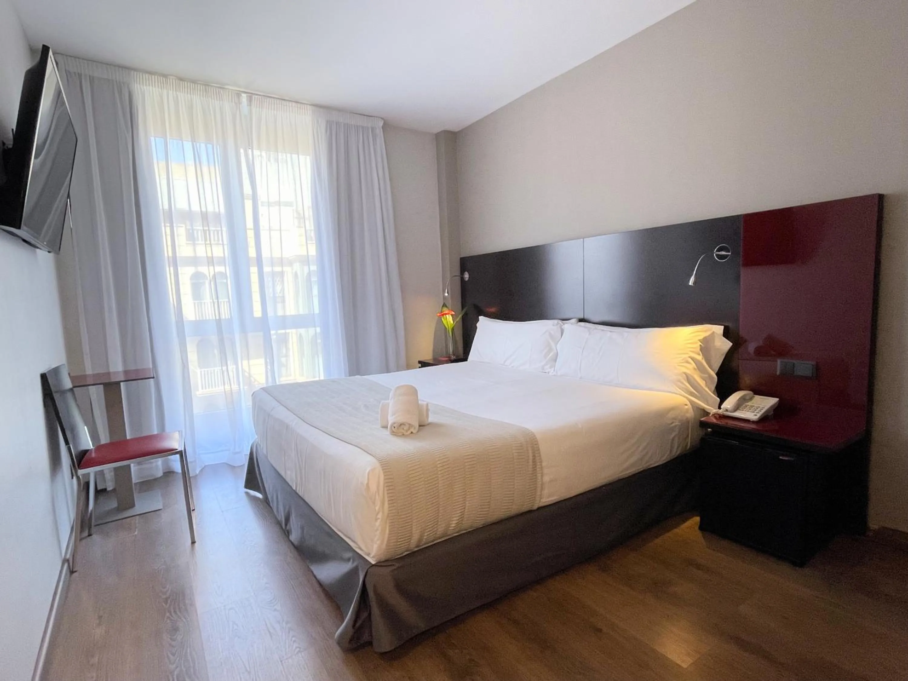 Photo of the whole room, Bed in SM Hotel Sant Antoni