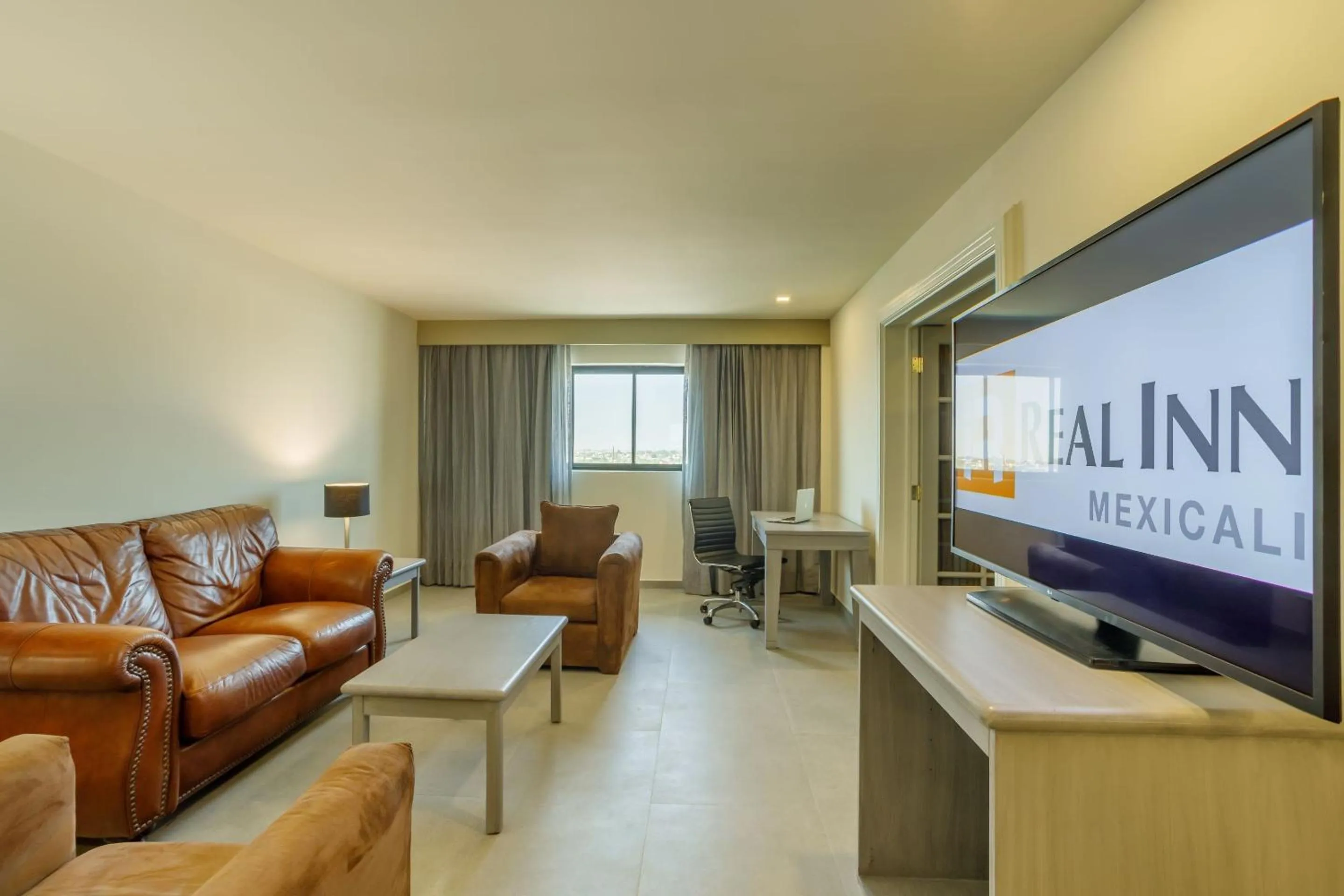 Photo of the whole room in Real Inn Mexicali