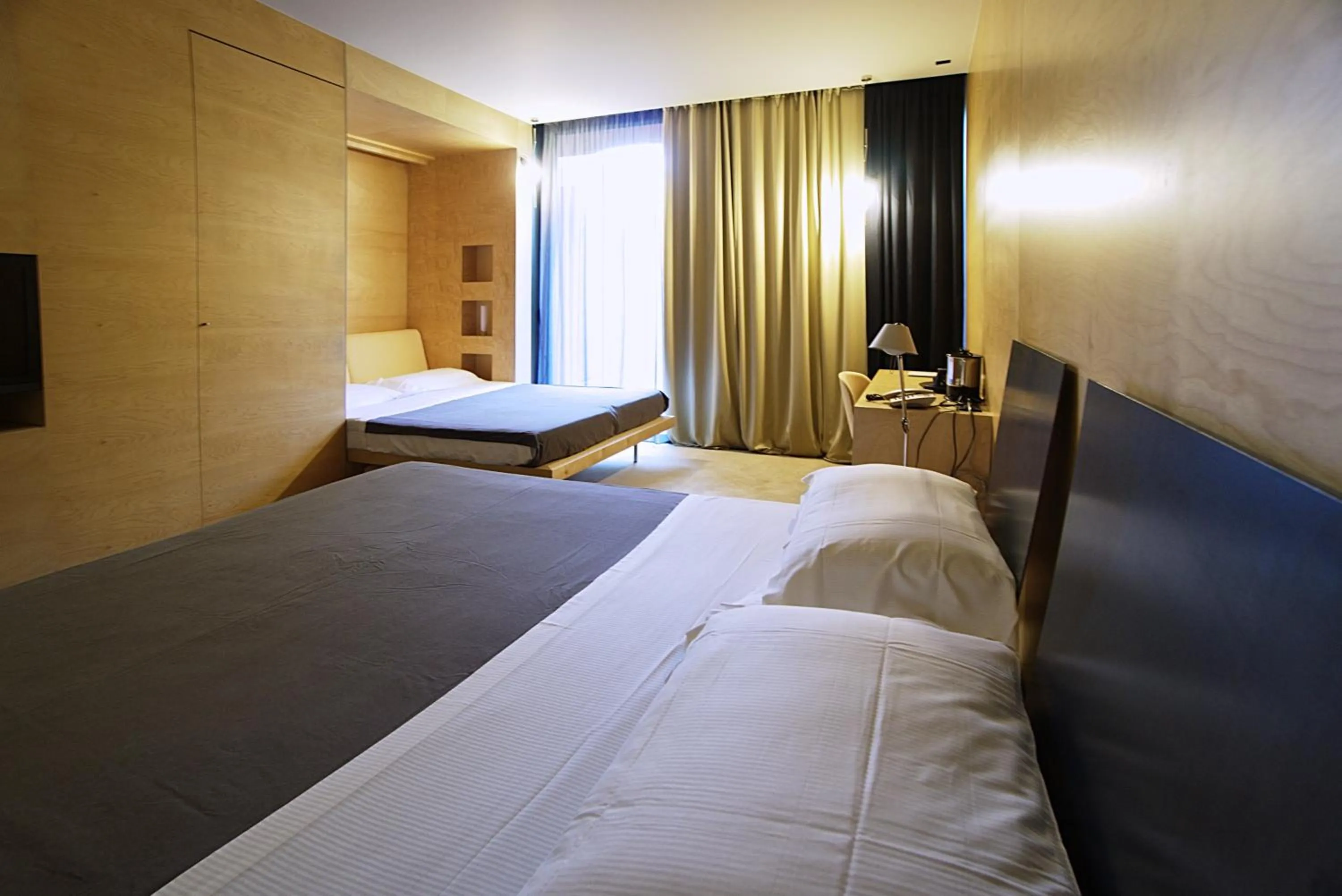 Bed in Hotel Clocchiatti Next