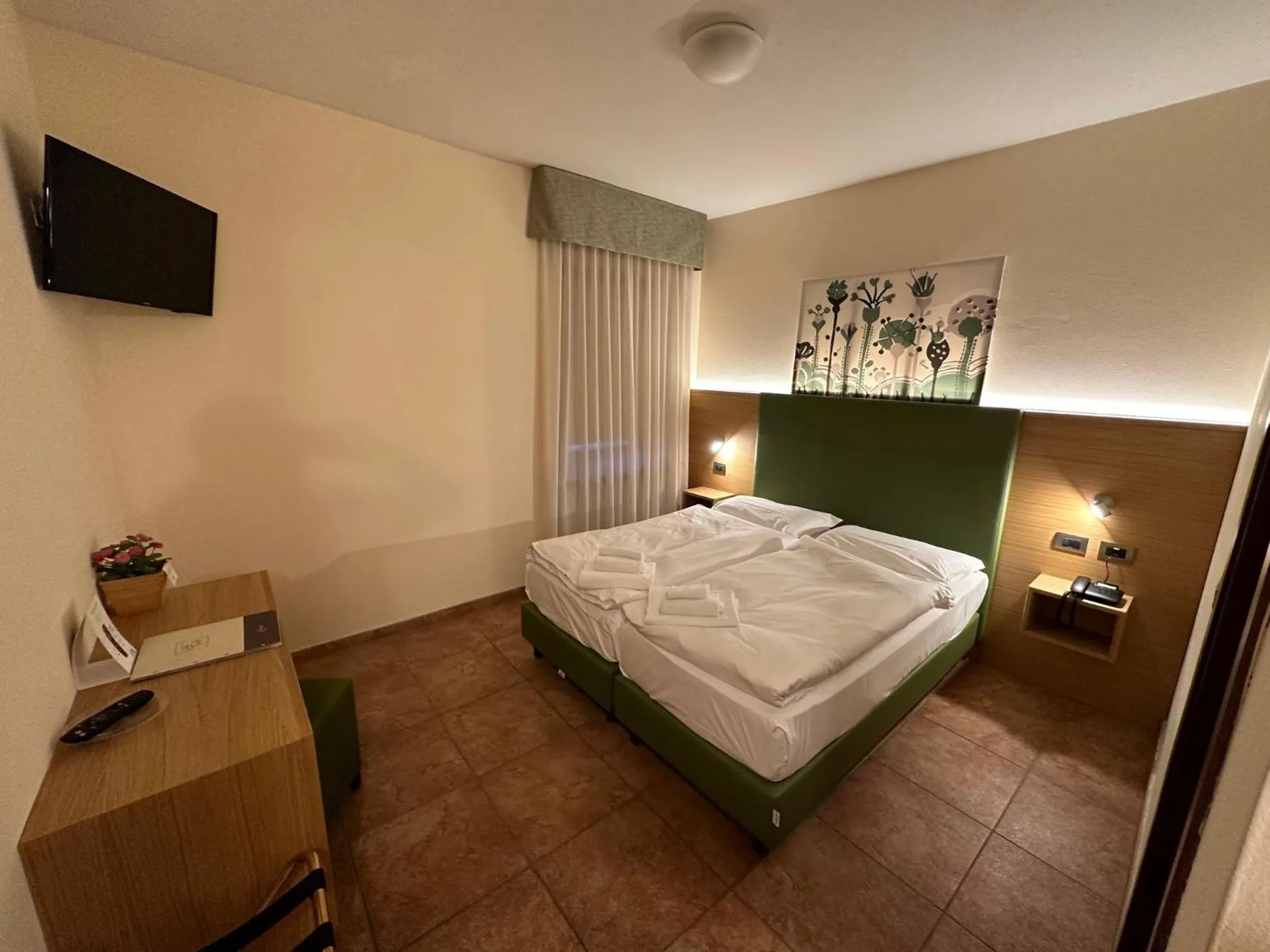 Bed in Hotel Trieste