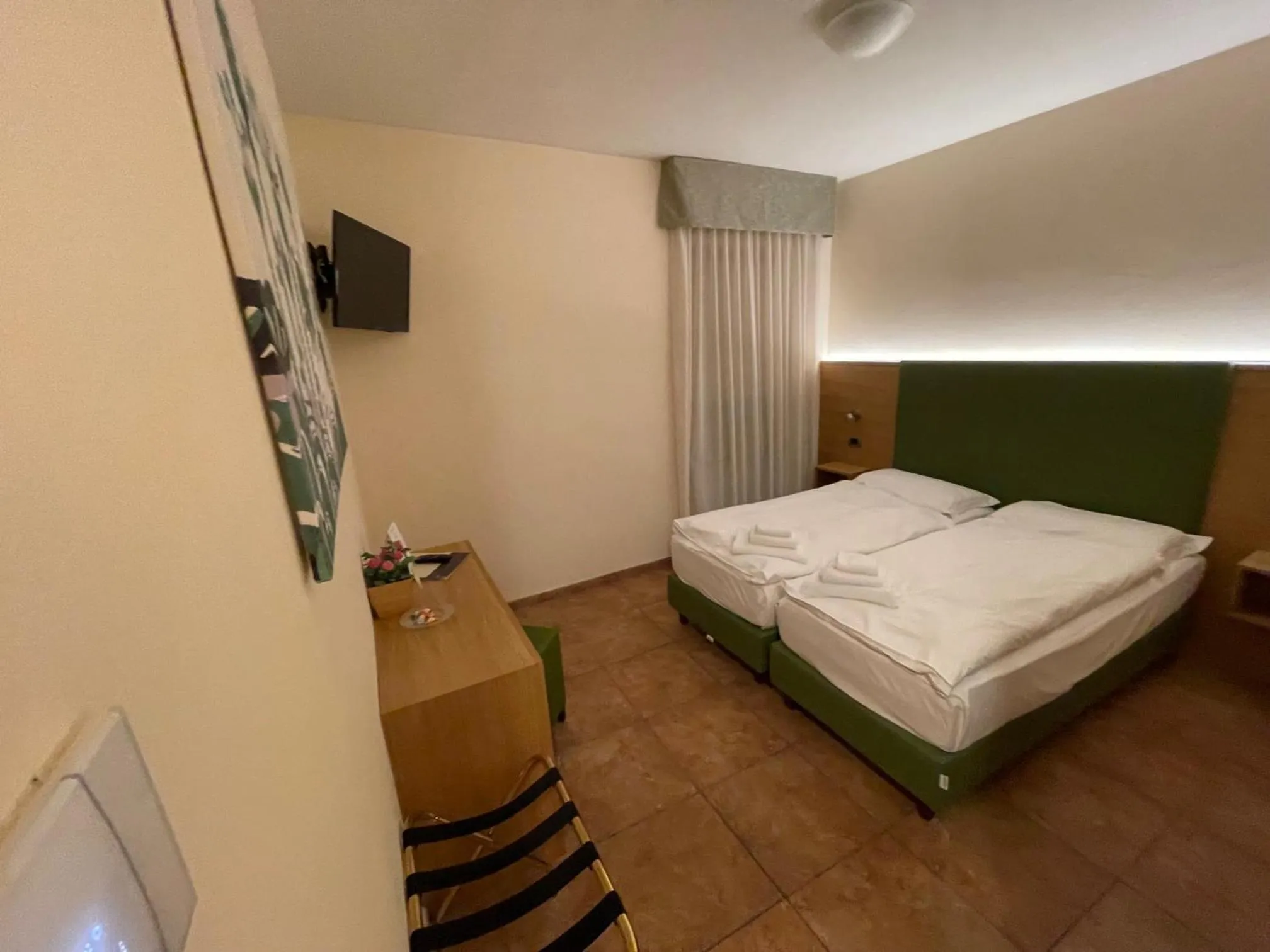 Bed in Hotel Trieste