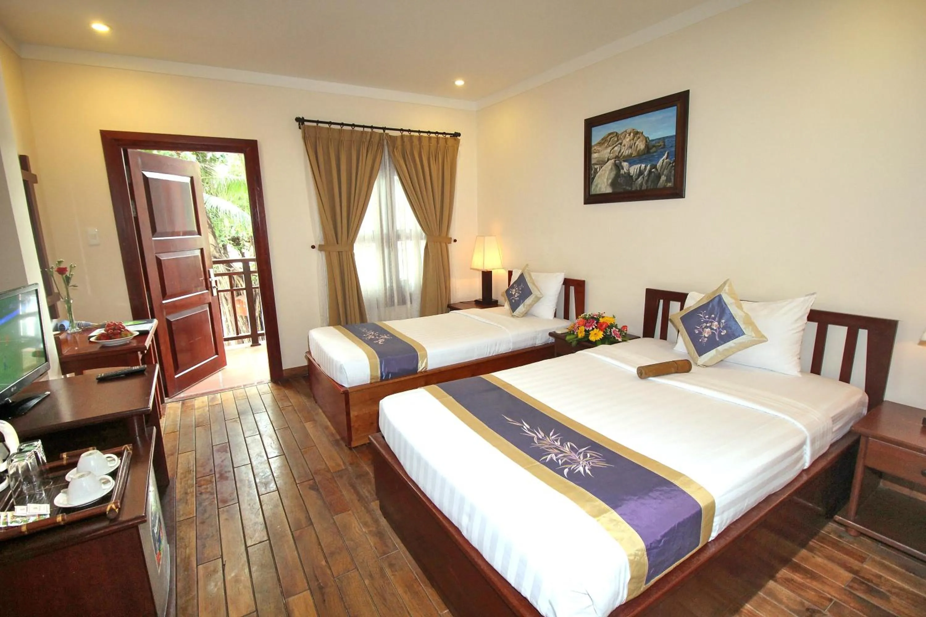 Bed in Novela Muine Resort & Spa