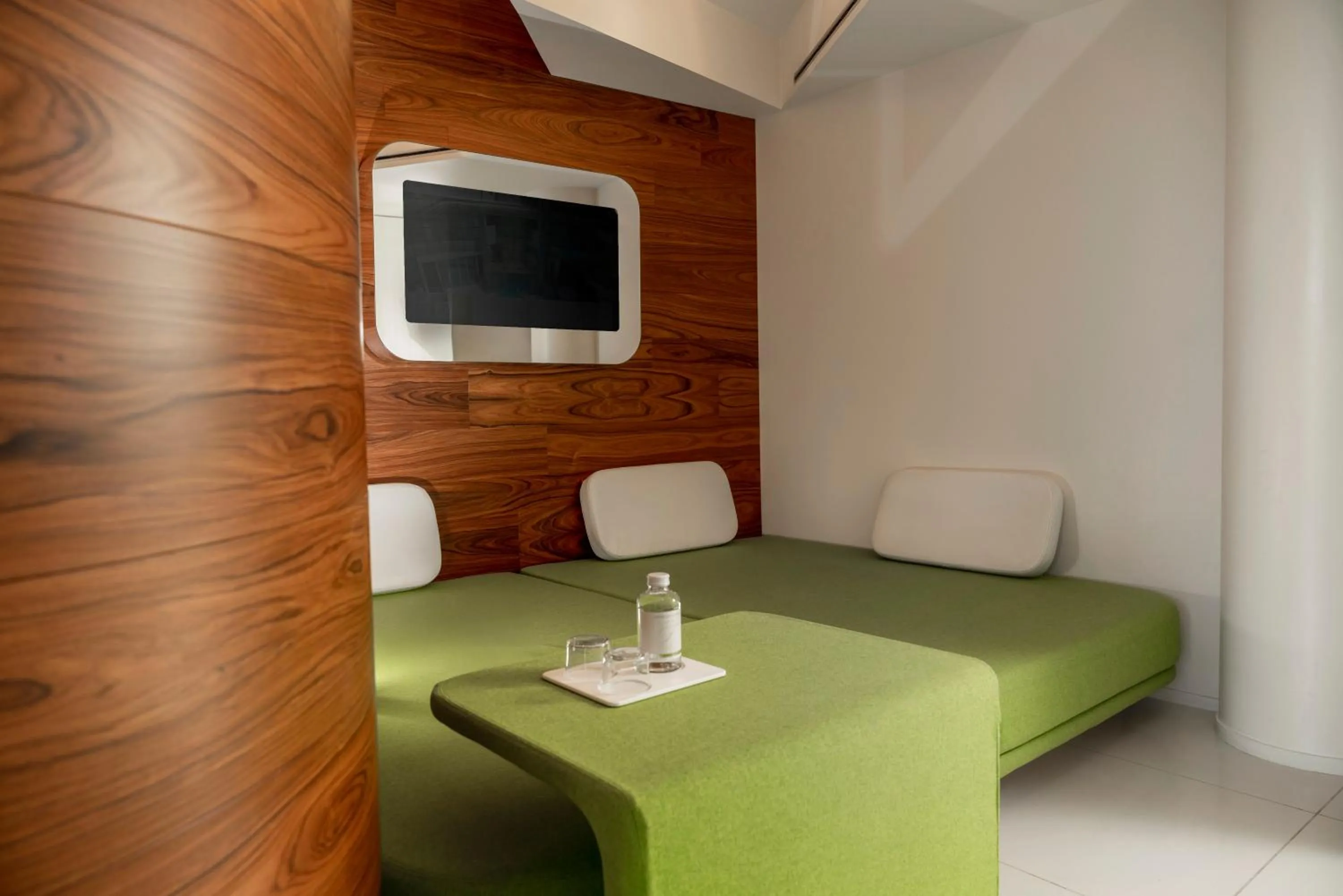 Bedroom in i-Suite Hotel