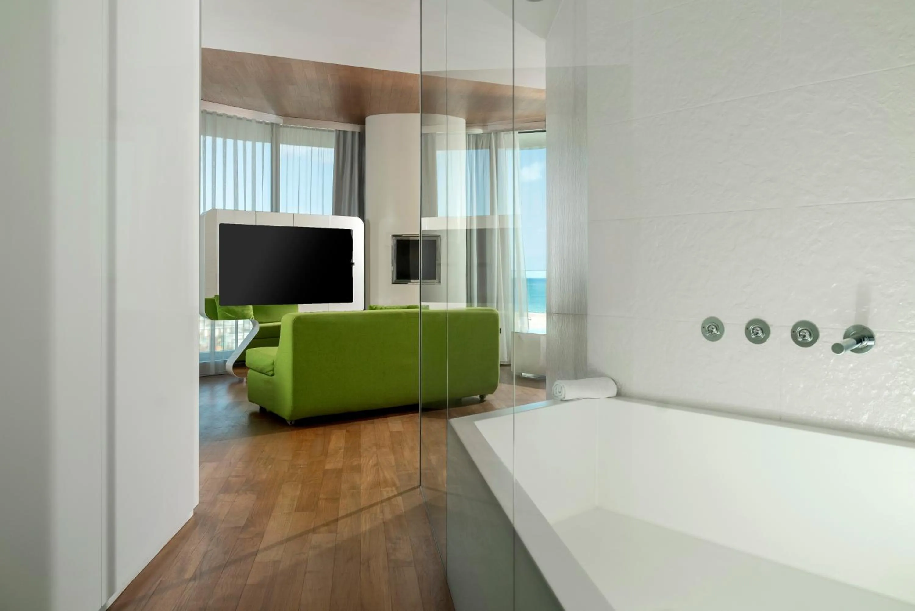 Bedroom in i-Suite Hotel