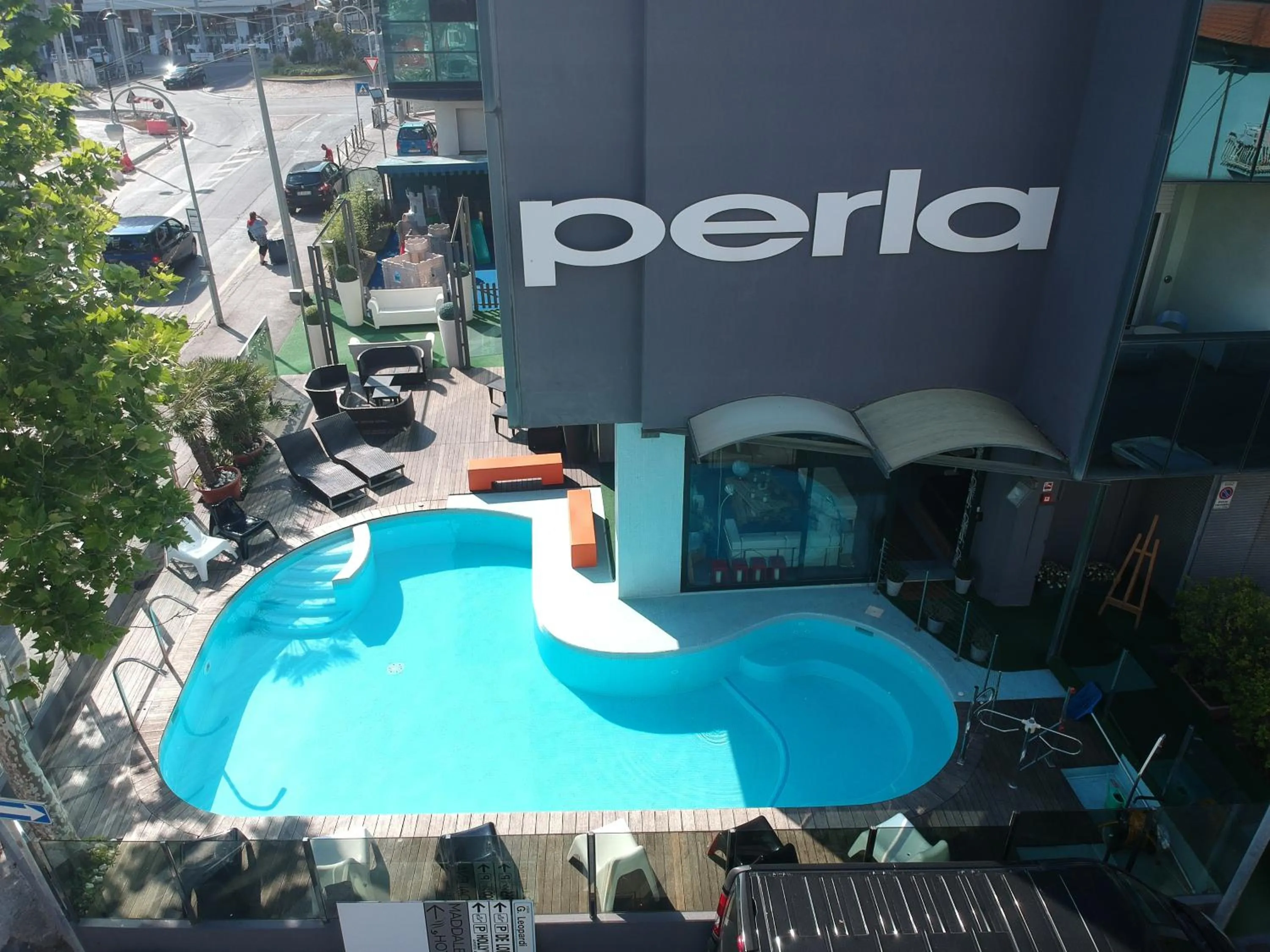 Property building in Hotel Perla - The storyhoteller