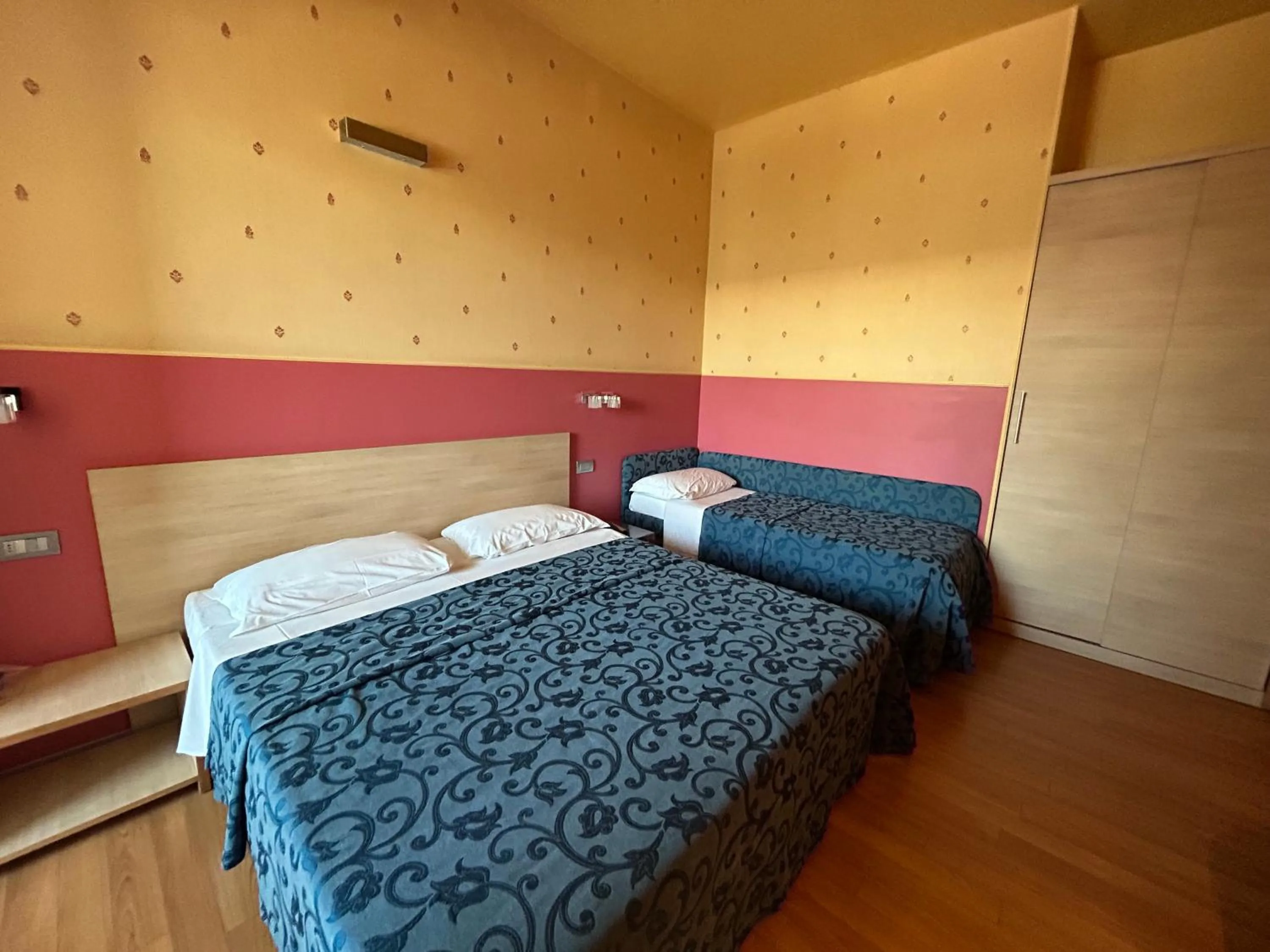 Bed in Hotel Perla - The storyhoteller