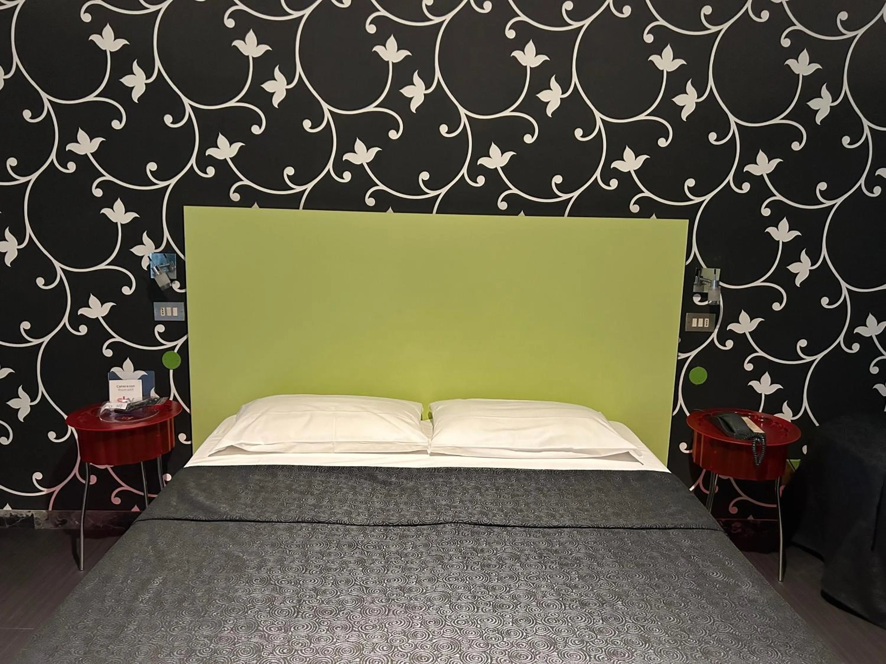 Bed in Hotel Perla - The storyhoteller