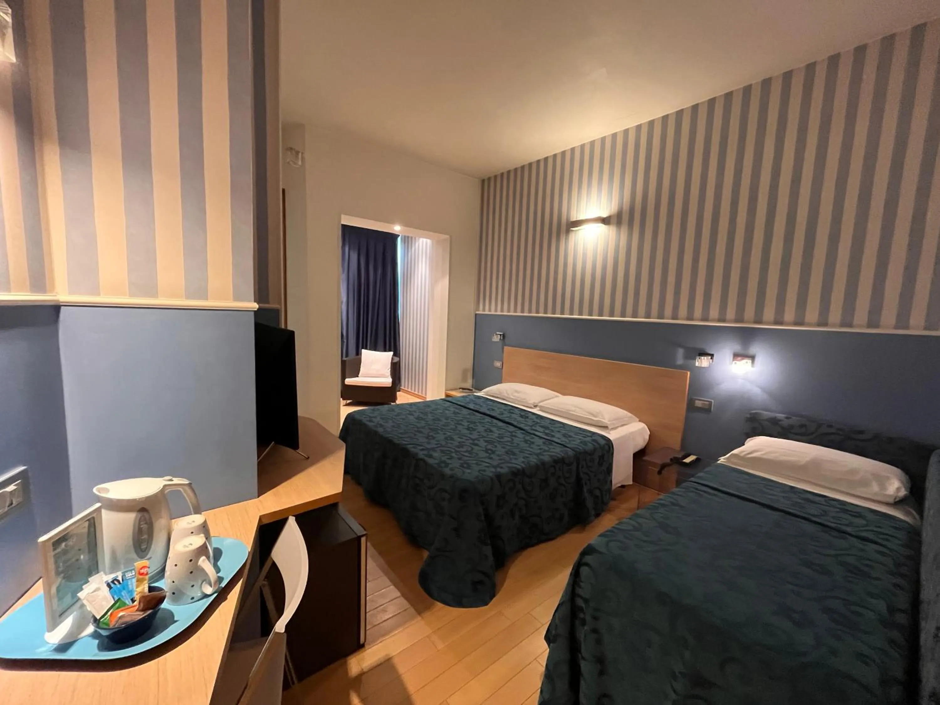 Photo of the whole room, Bed in Hotel Perla - The storyhoteller