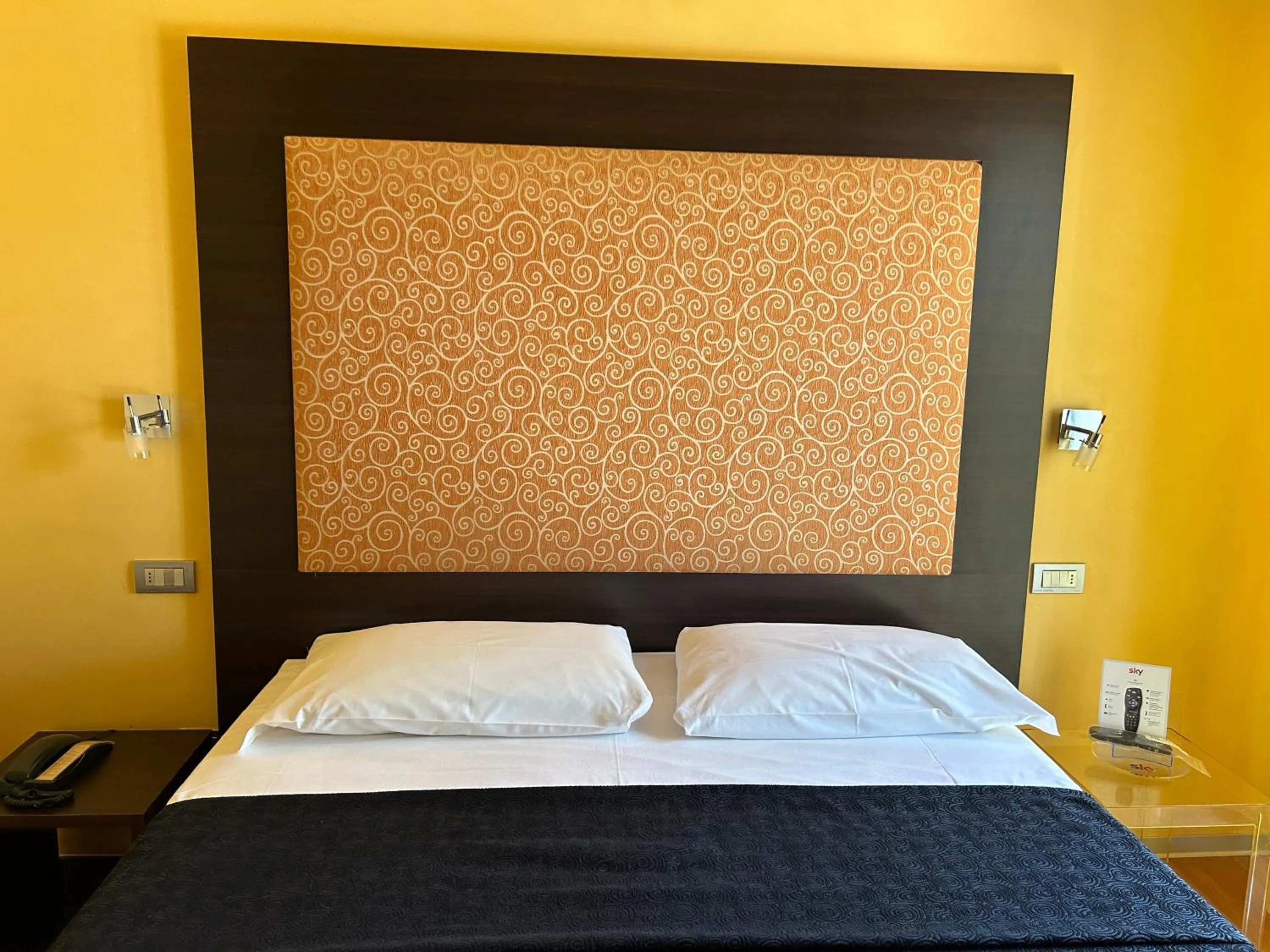 Decorative detail, Bed in Hotel Perla - The storyhoteller