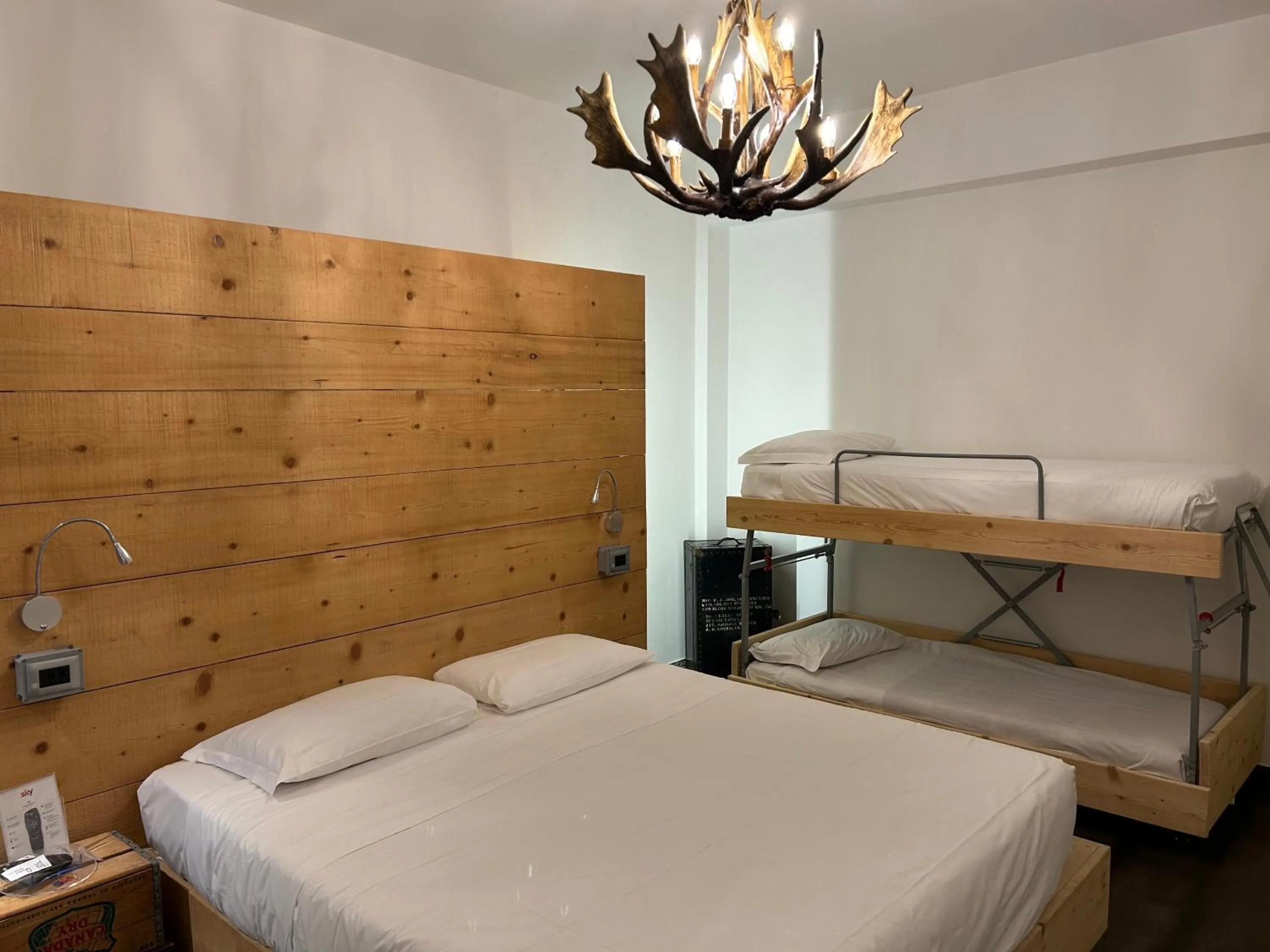 Bed in Hotel Perla - The storyhoteller