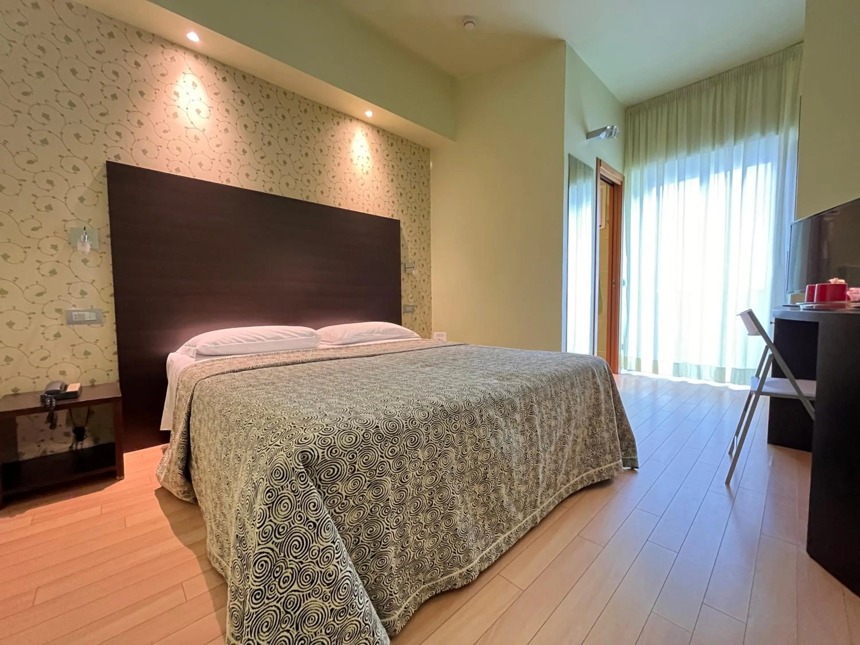 Bed in Hotel Perla - The storyhoteller