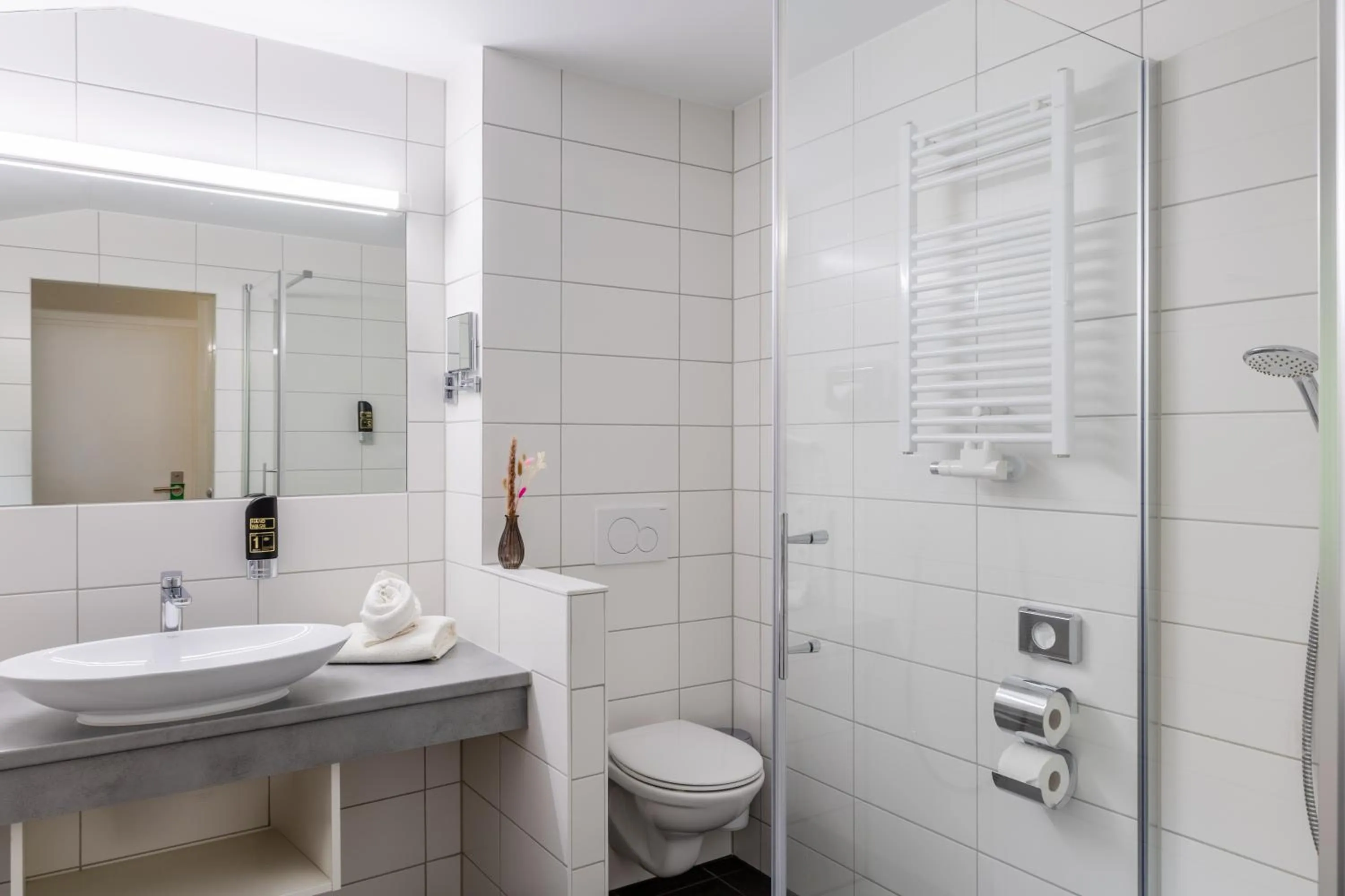 Bathroom in Panoramahotel Kühbergalp