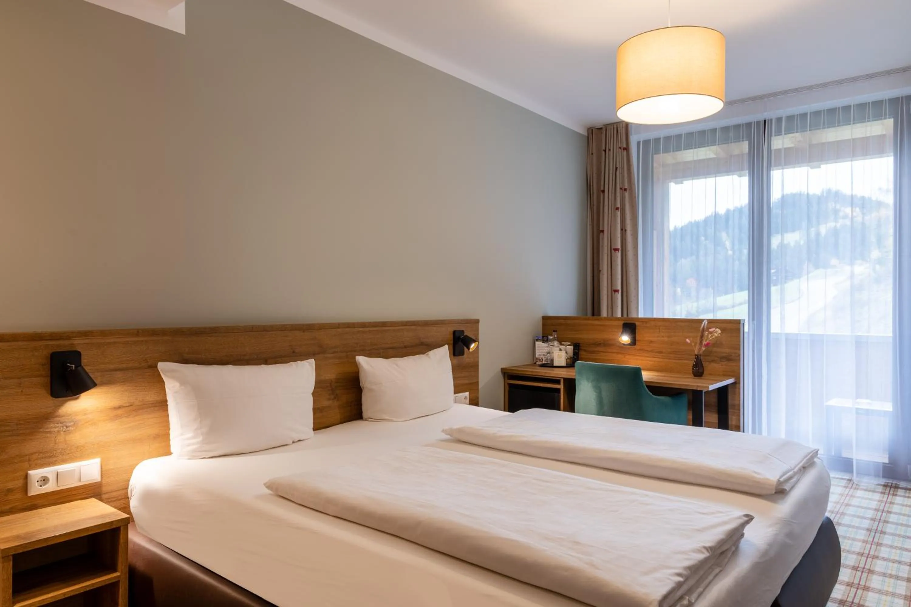 Bedroom, Bed in Panoramahotel Kühbergalp