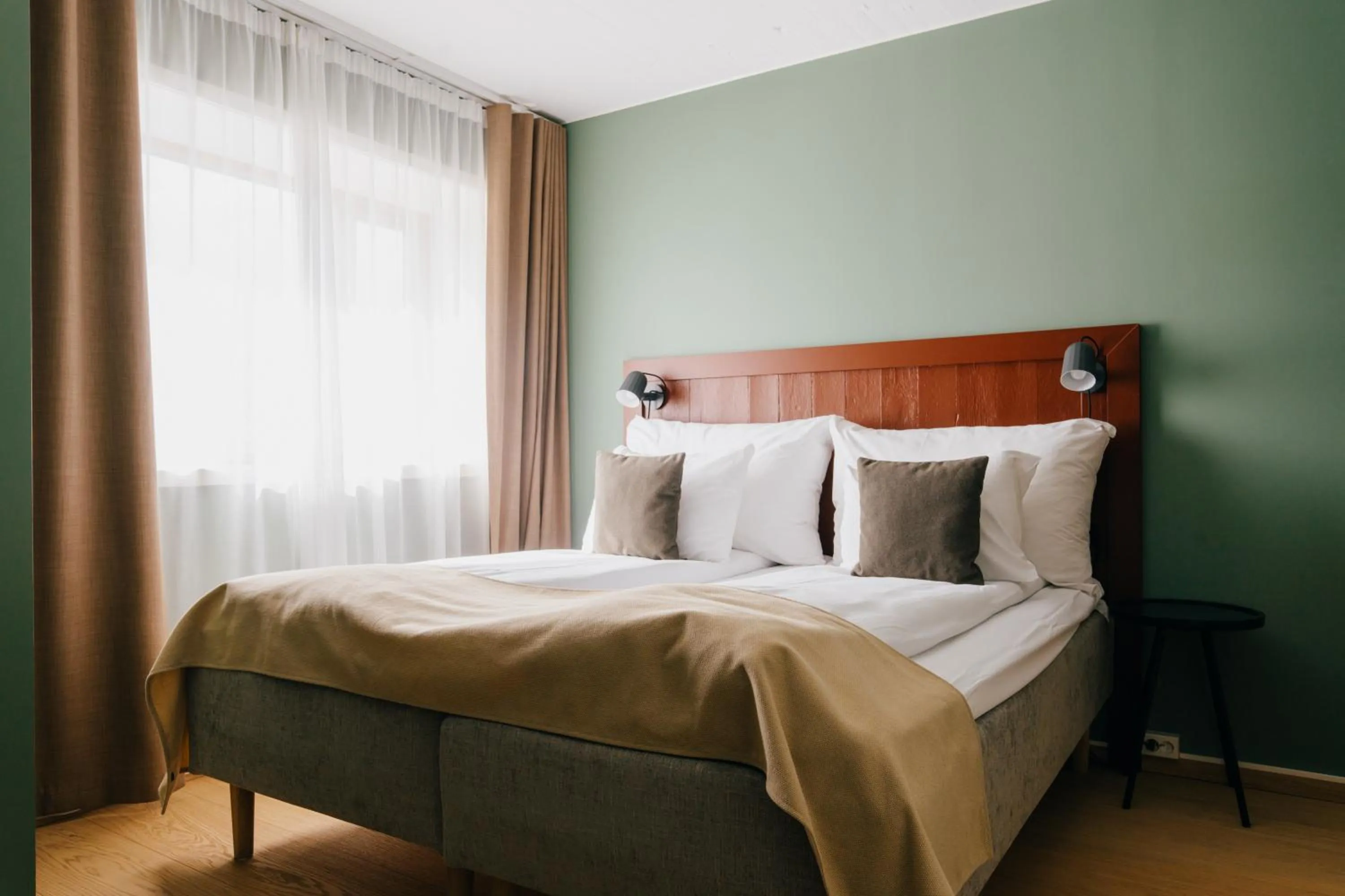 Bed in GamlaVærket Gjæstgiveri og Tracteringssted