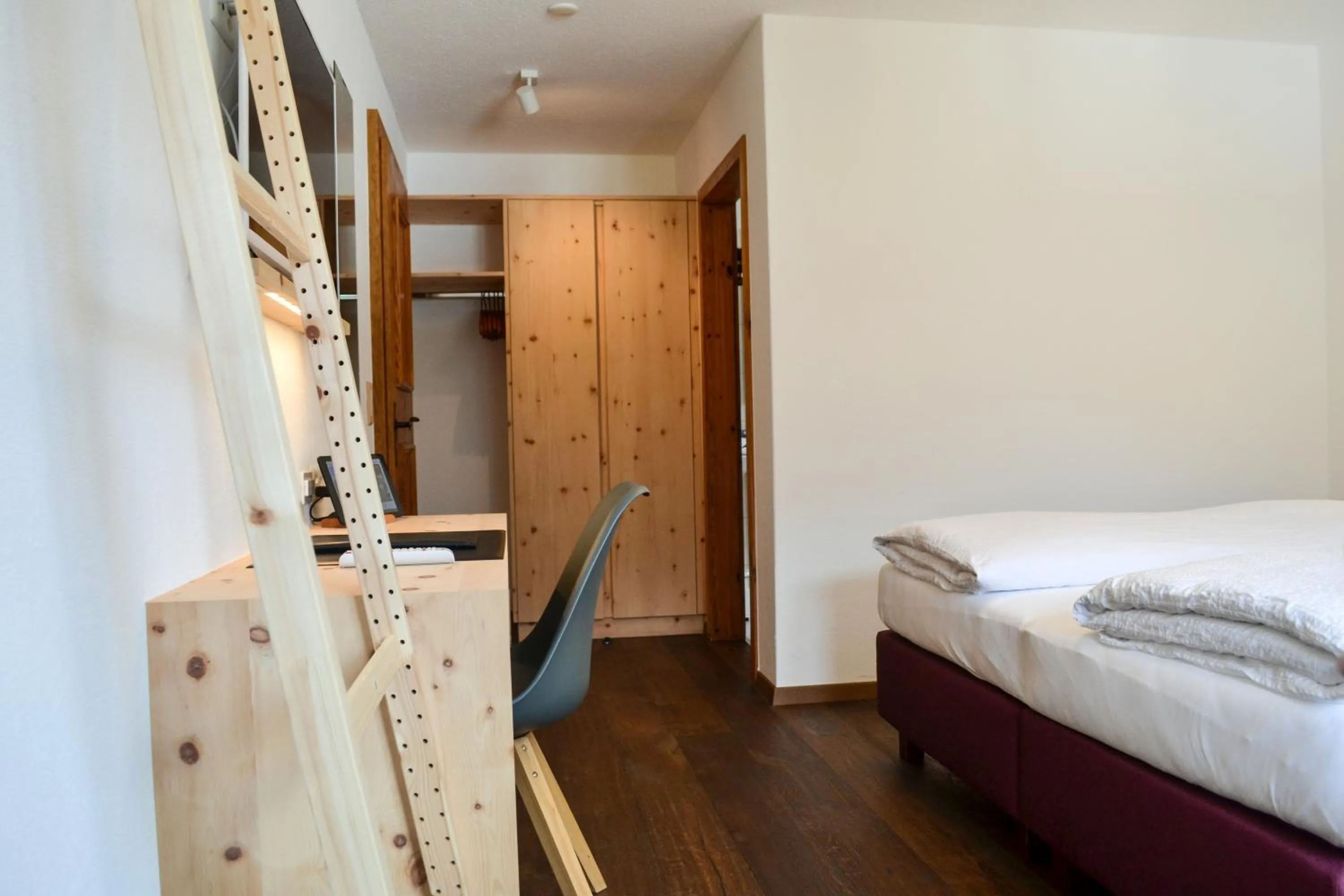 Photo of the whole room, Bed in Schorta's Alvetern - Boutique Hotel