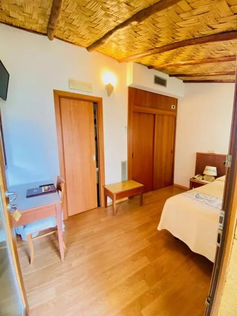 Bed in Hotel Villa Canu