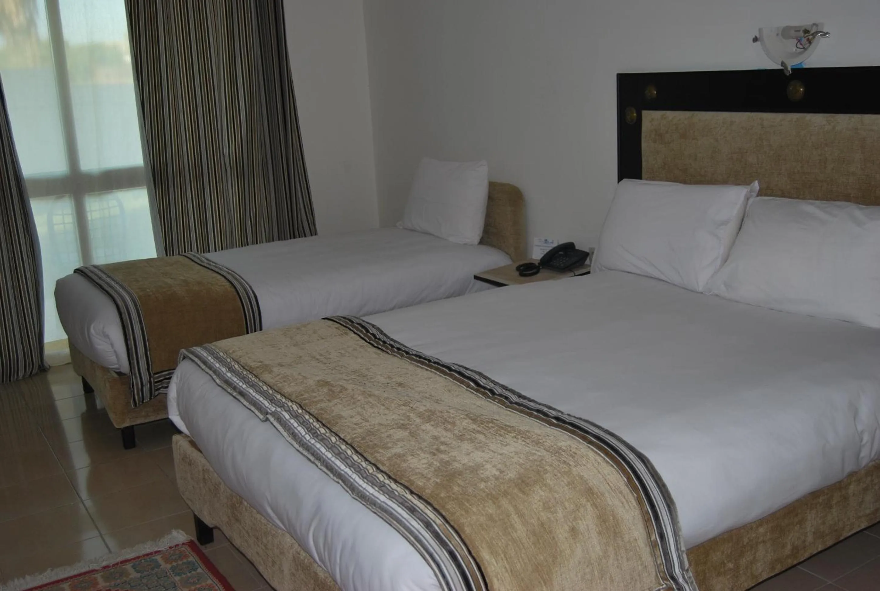 Bed in Hotel Al Khaima