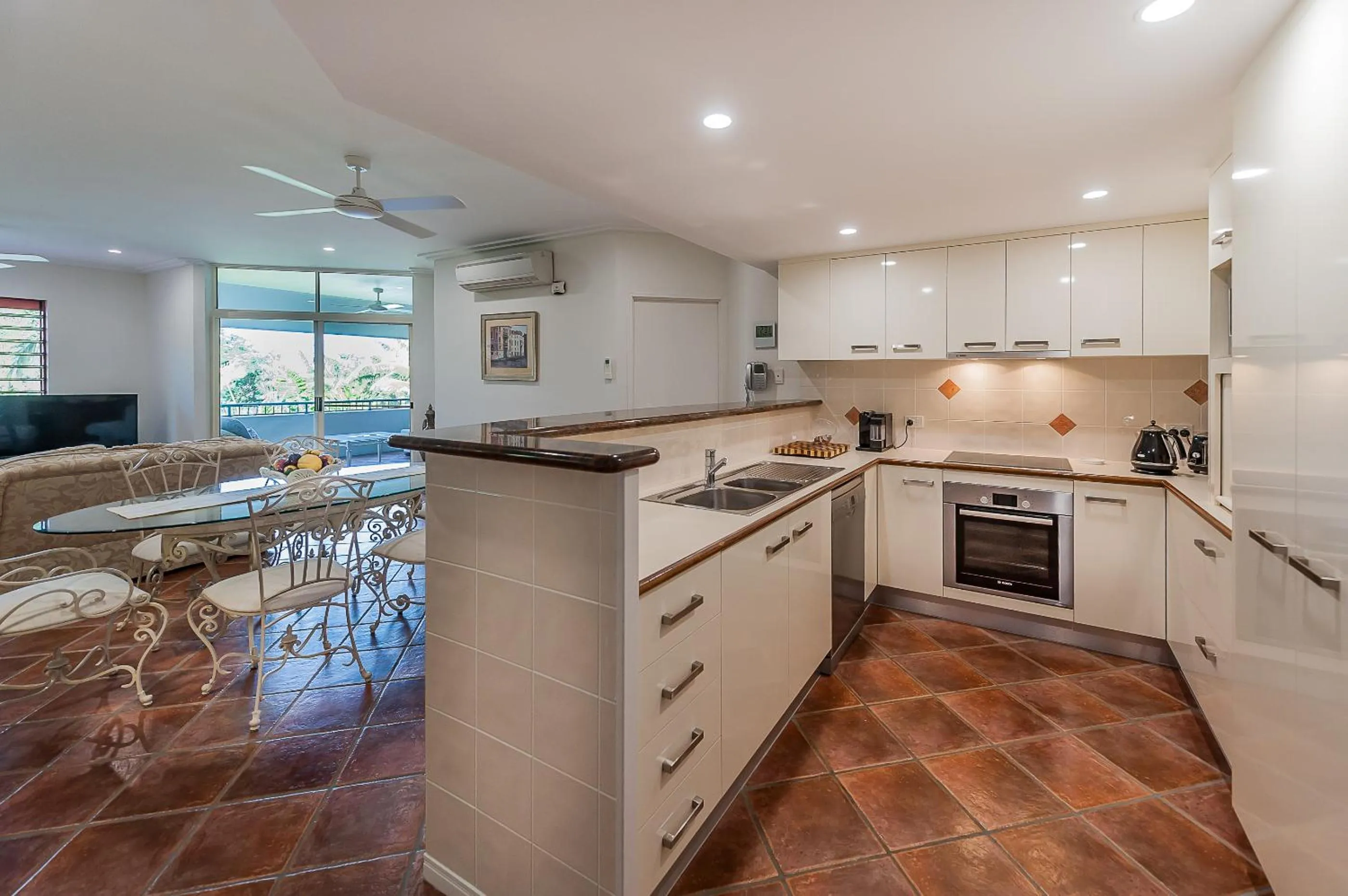 Kitchen or kitchenette in Oasis at Palm Cove