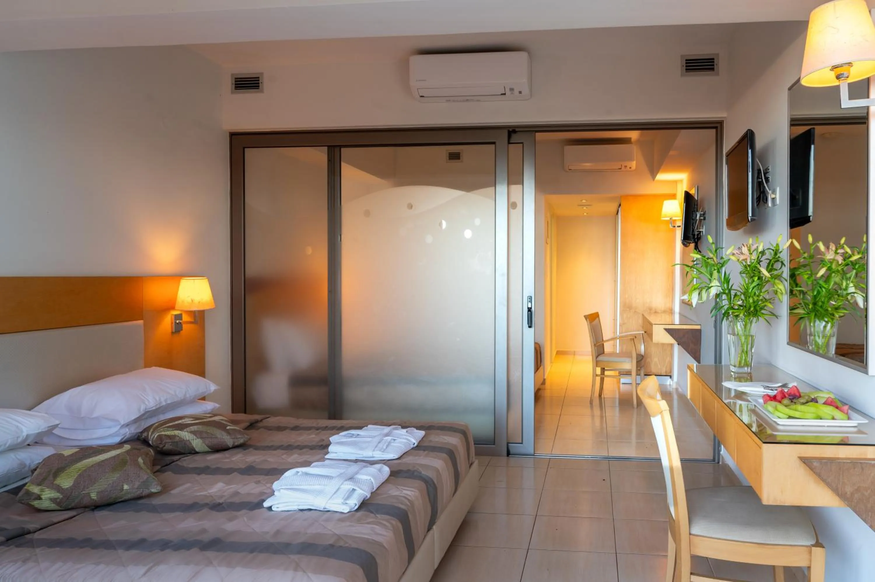 Bed in Grand Hotel Holiday Resort