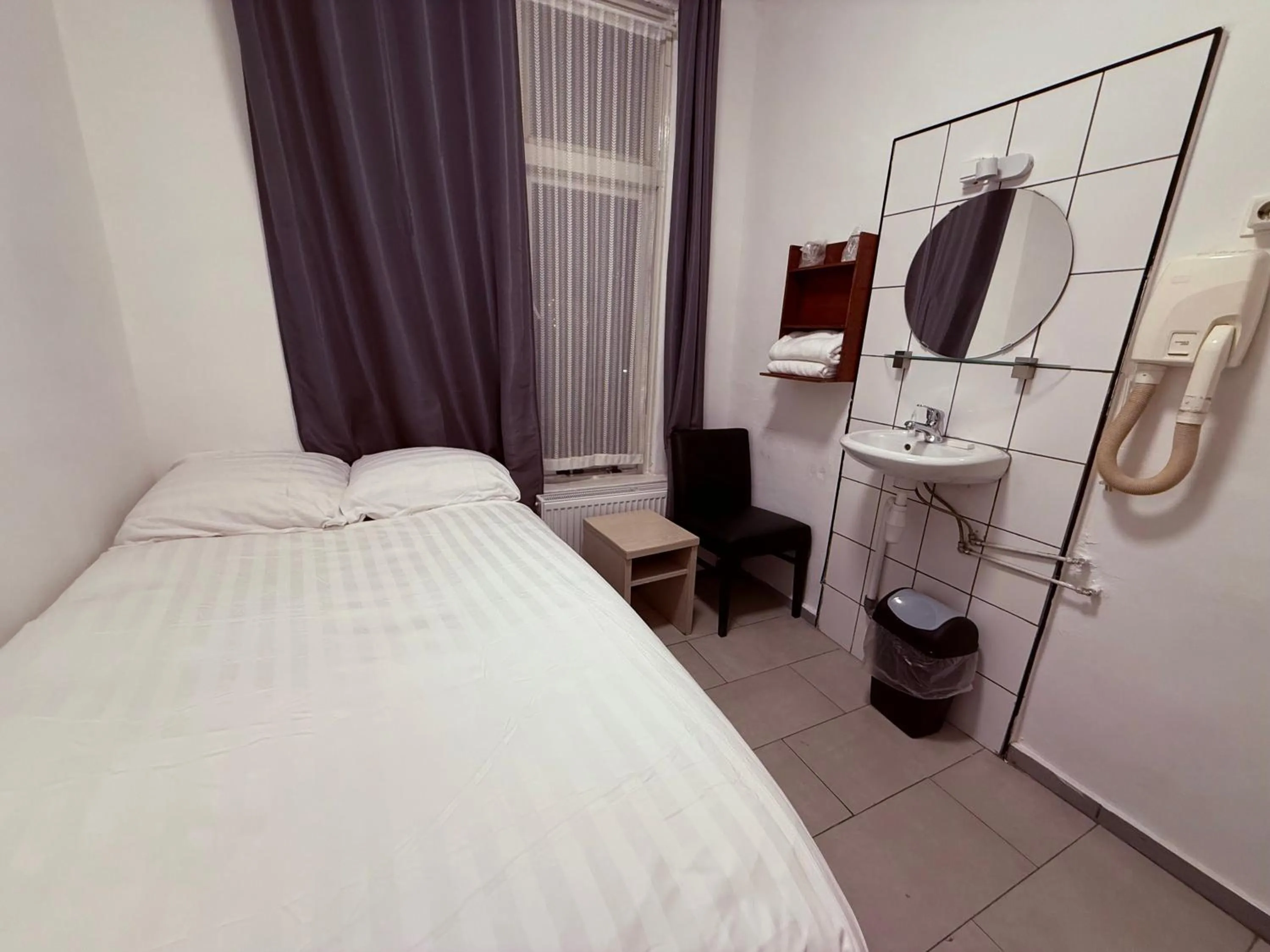 Bed in Hotel Schroder