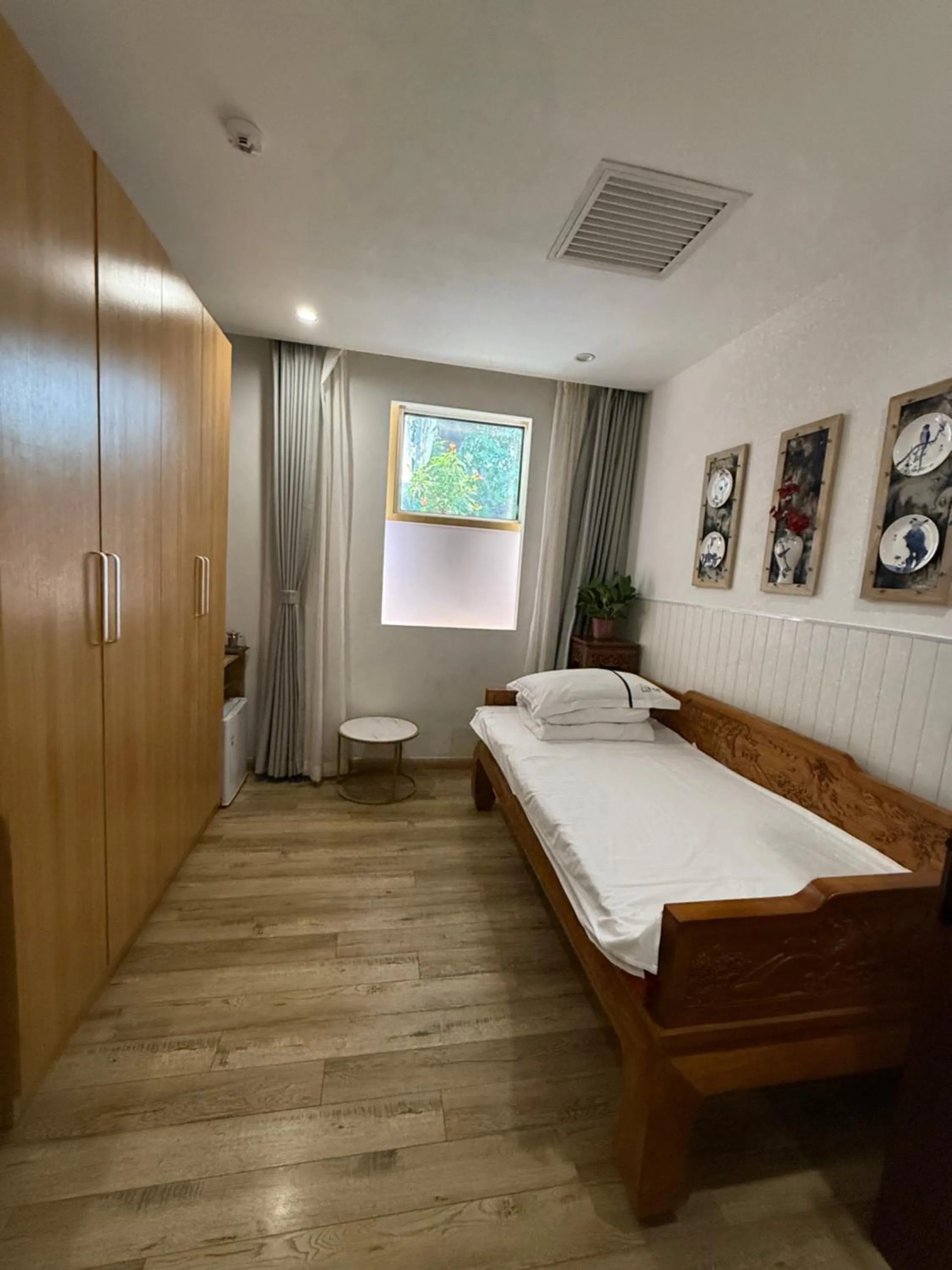 Bed in Xingshe Alley Courtyard Hotel Beijing Wangfujing Forbidden City