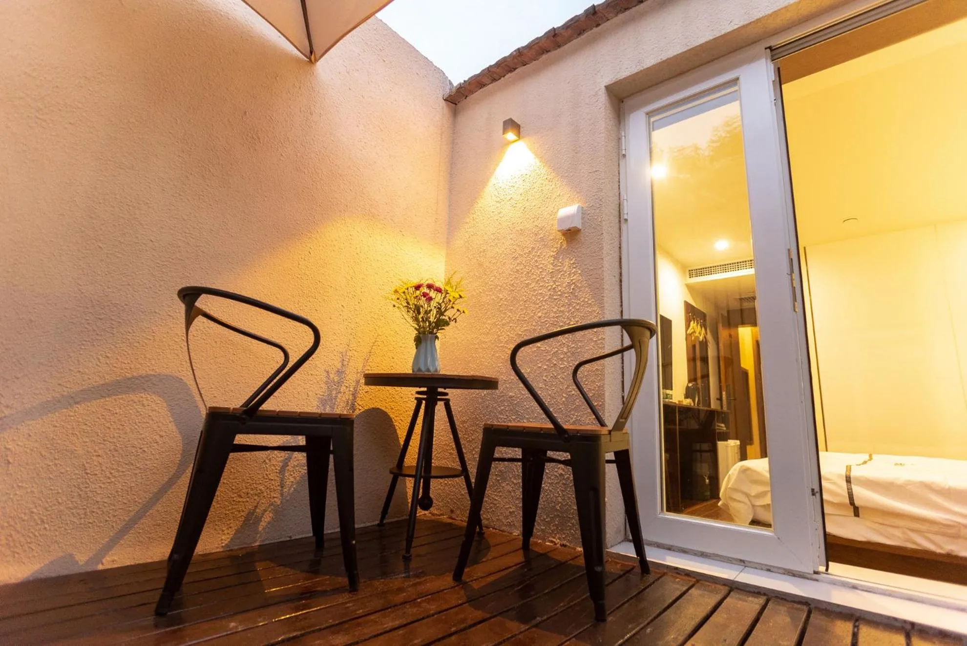 Balcony/Terrace in Xingshe Alley Courtyard Hotel Beijing Wangfujing Forbidden City Branch - Breakfast included & English speaking reception & Free WiFi and Laundry room & Hutong Culture & Cat-keeping & Flower-growing Terrace & One day tour service & Free coffee