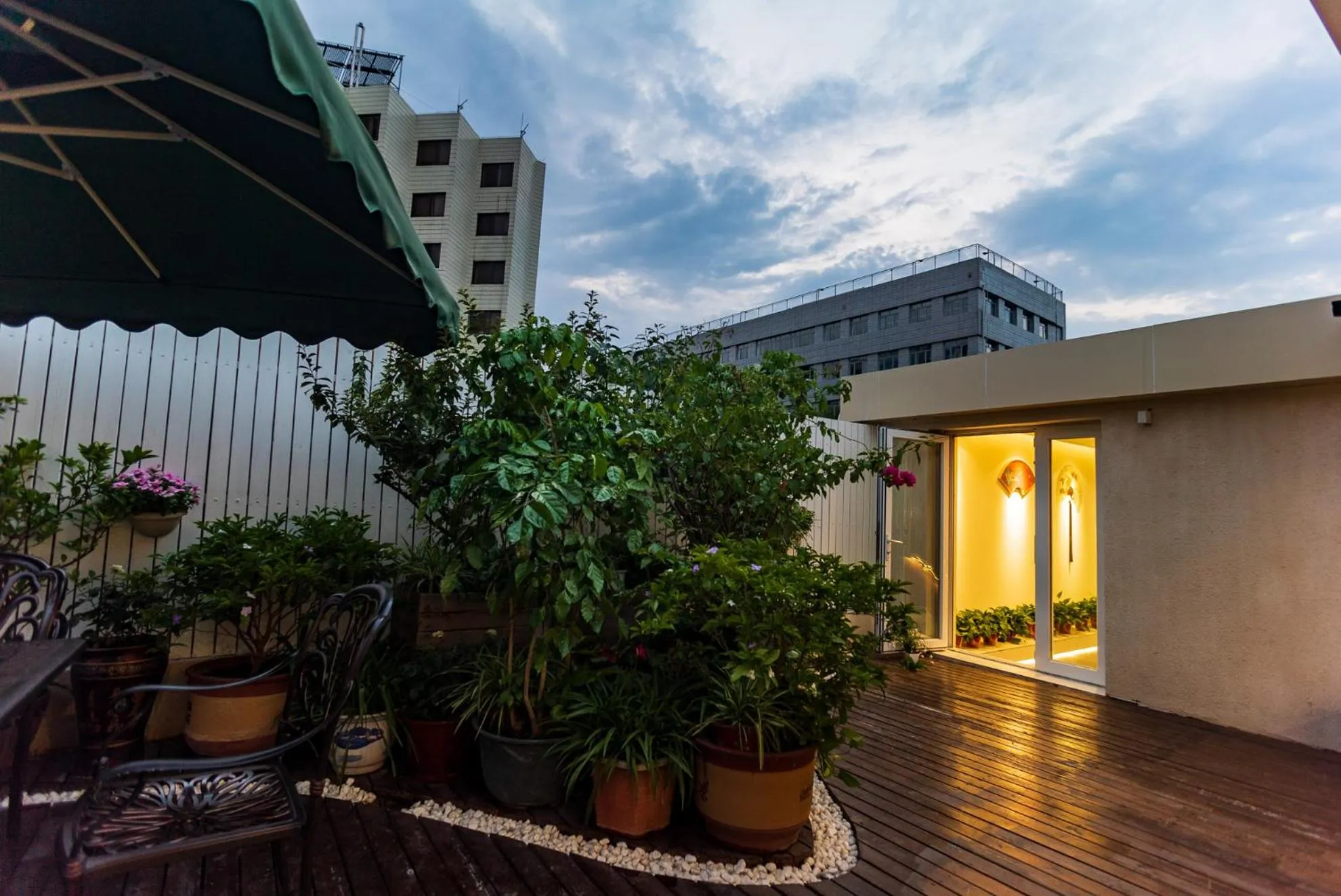 Balcony/Terrace in Xingshe Alley Courtyard Hotel Beijing Wangfujing Forbidden City Branch - Breakfast included & English speaking reception & Free WiFi and Laundry room & Hutong Culture & Cat-keeping & Flower-growing Terrace & One day tour service & Free coffee