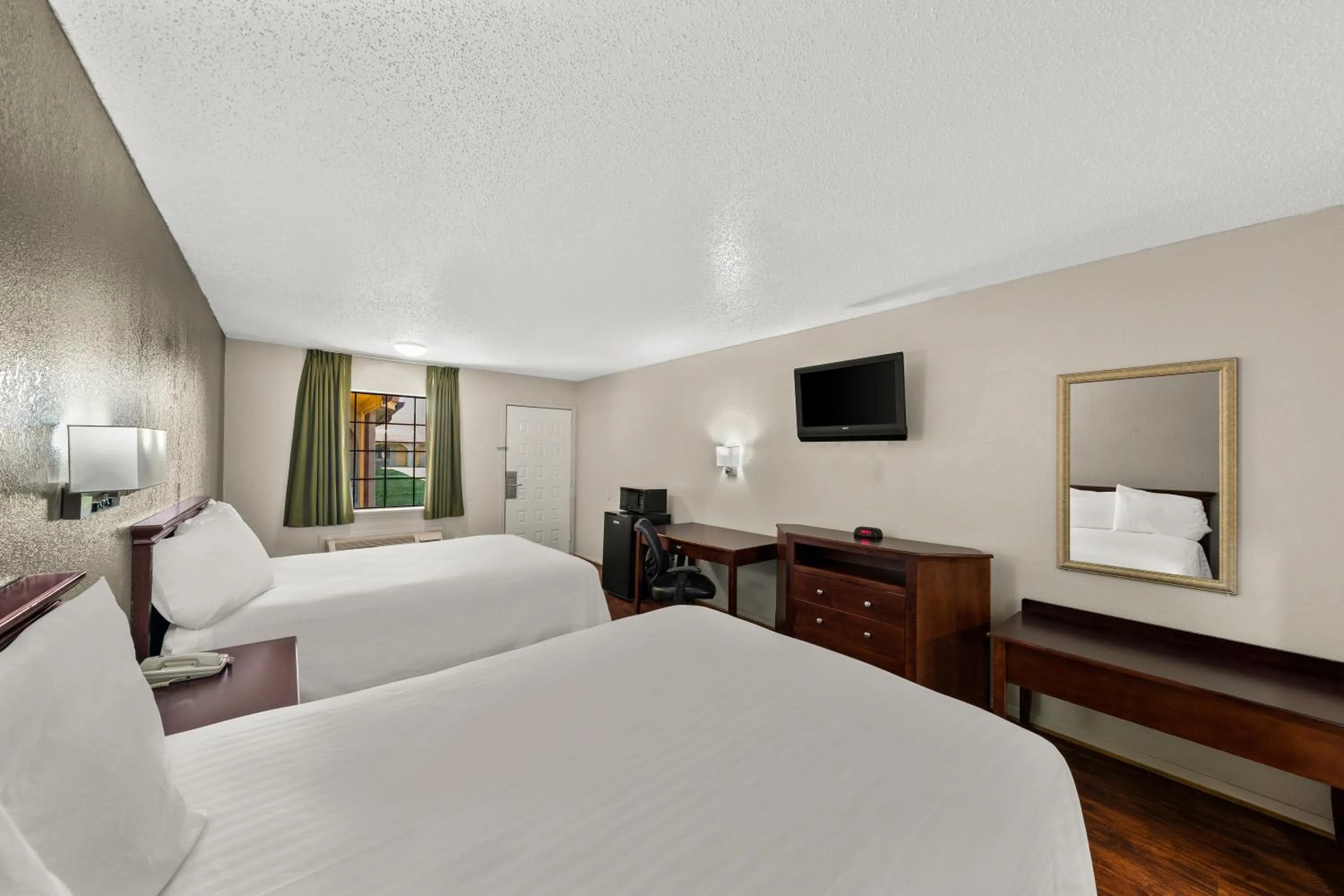 Bed in Americas Best Value Inn Bonham