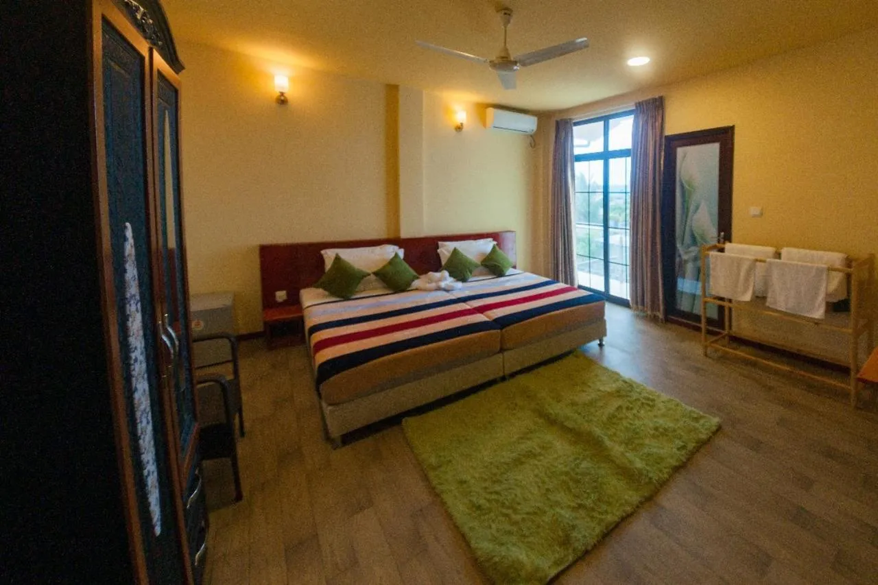 Bed in Annama Lodge and Dive