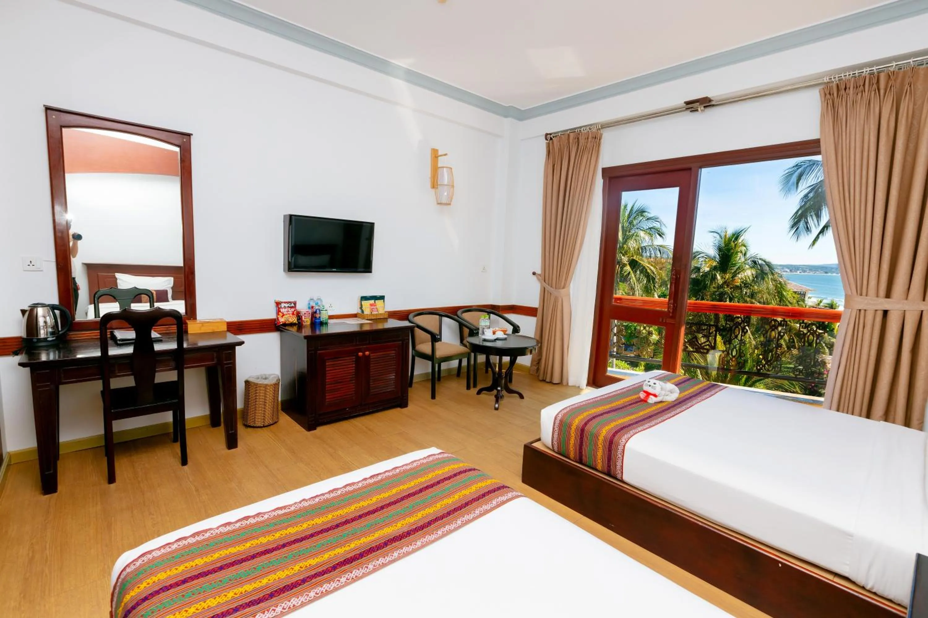 Bed in Ca Ty Mui ne Beach Resort & Spa