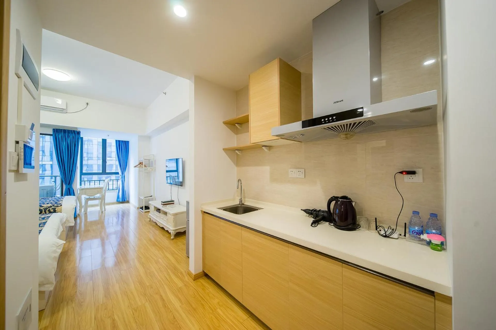 Kitchen or kitchenette in Guangzhou Laiste ApartHotel Science City Greenland Central Plaza Branch - Free Shuttle Bus to Canton Fair Complex During Canton Fair Period