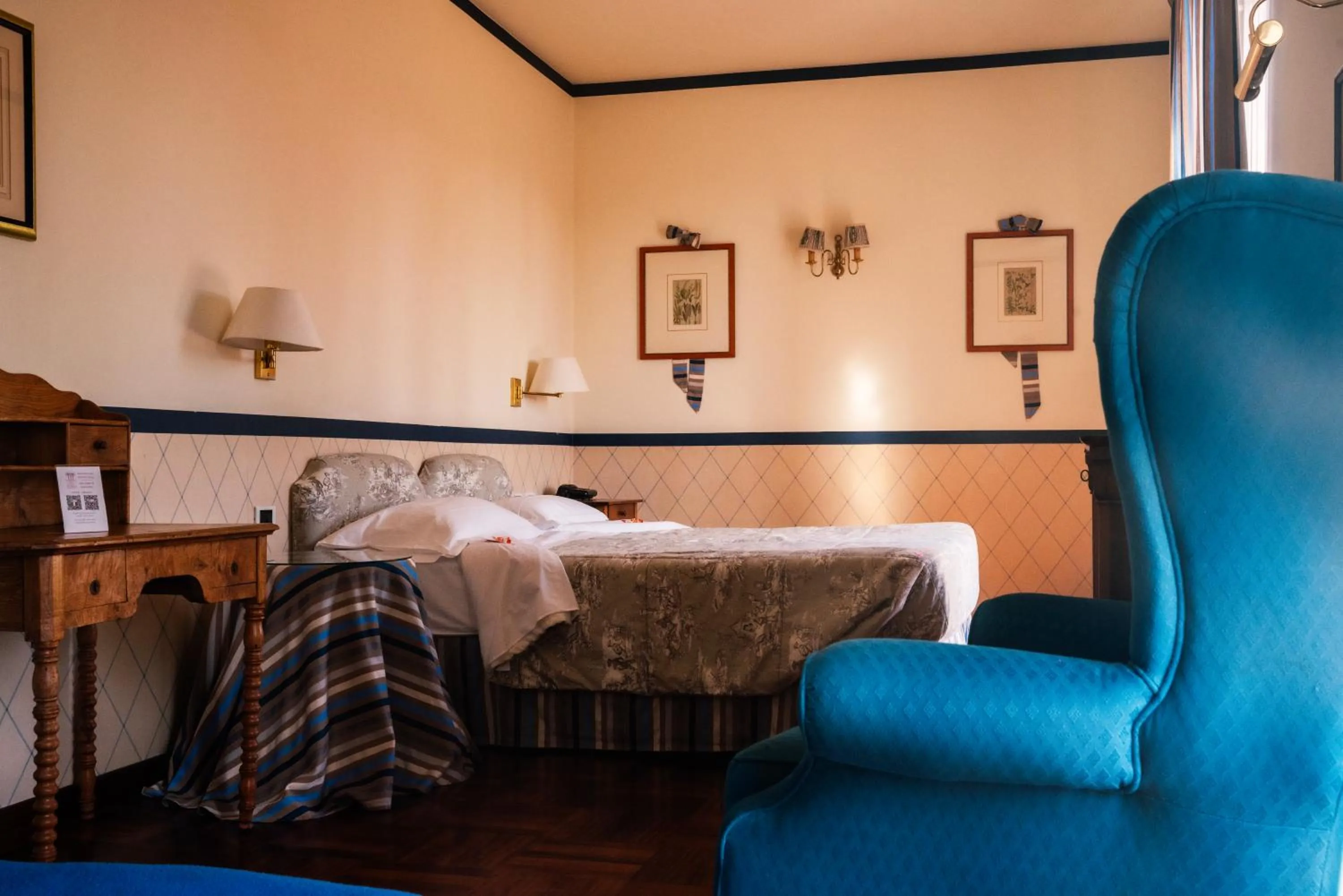 Bed in Relais Villa Pomela