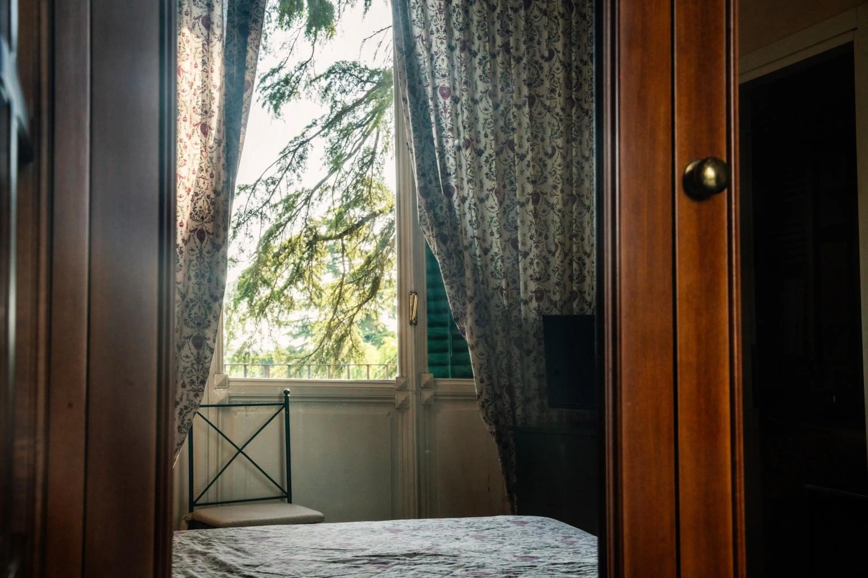 Bed in Relais Villa Pomela