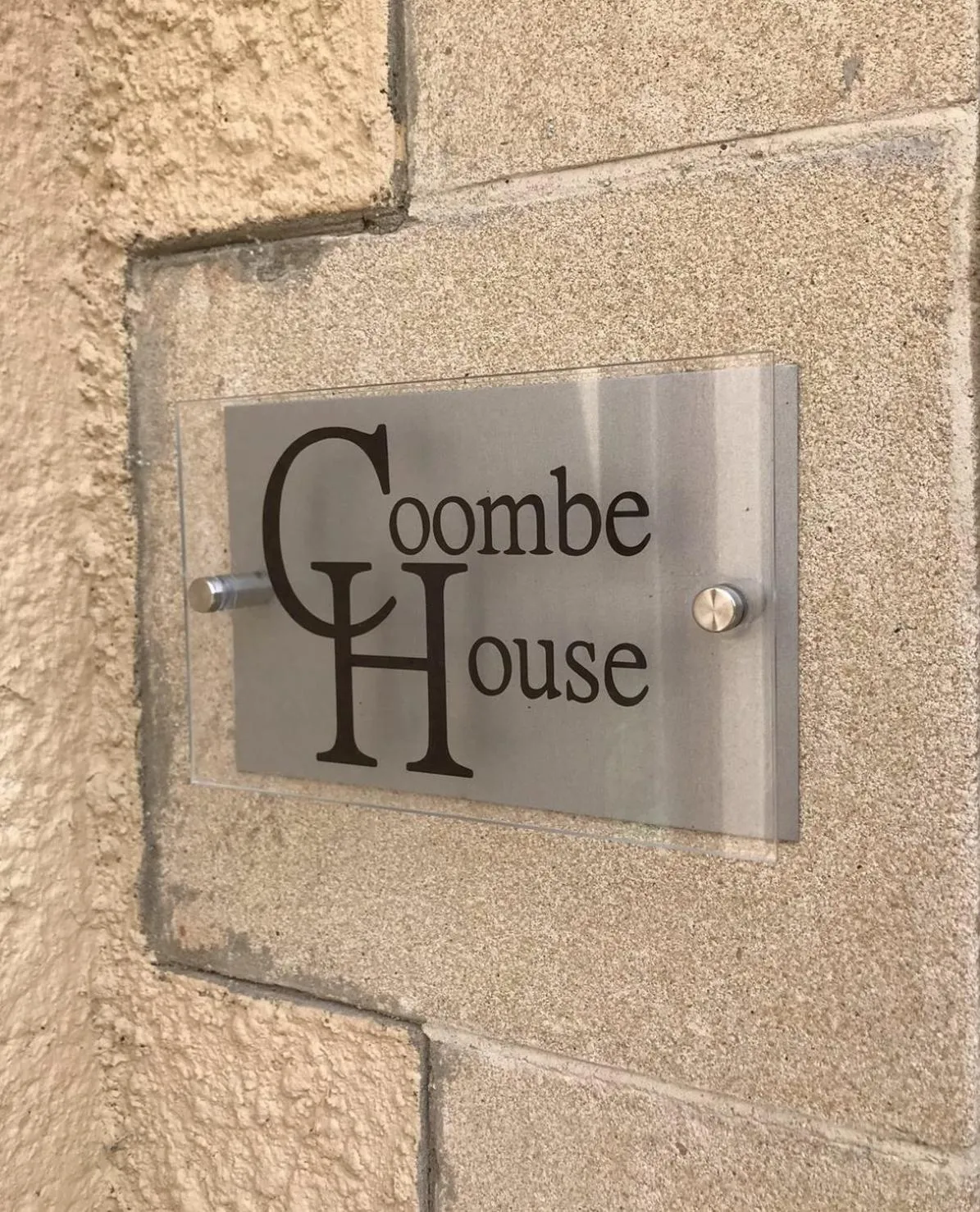 Property logo or sign in Coombe House