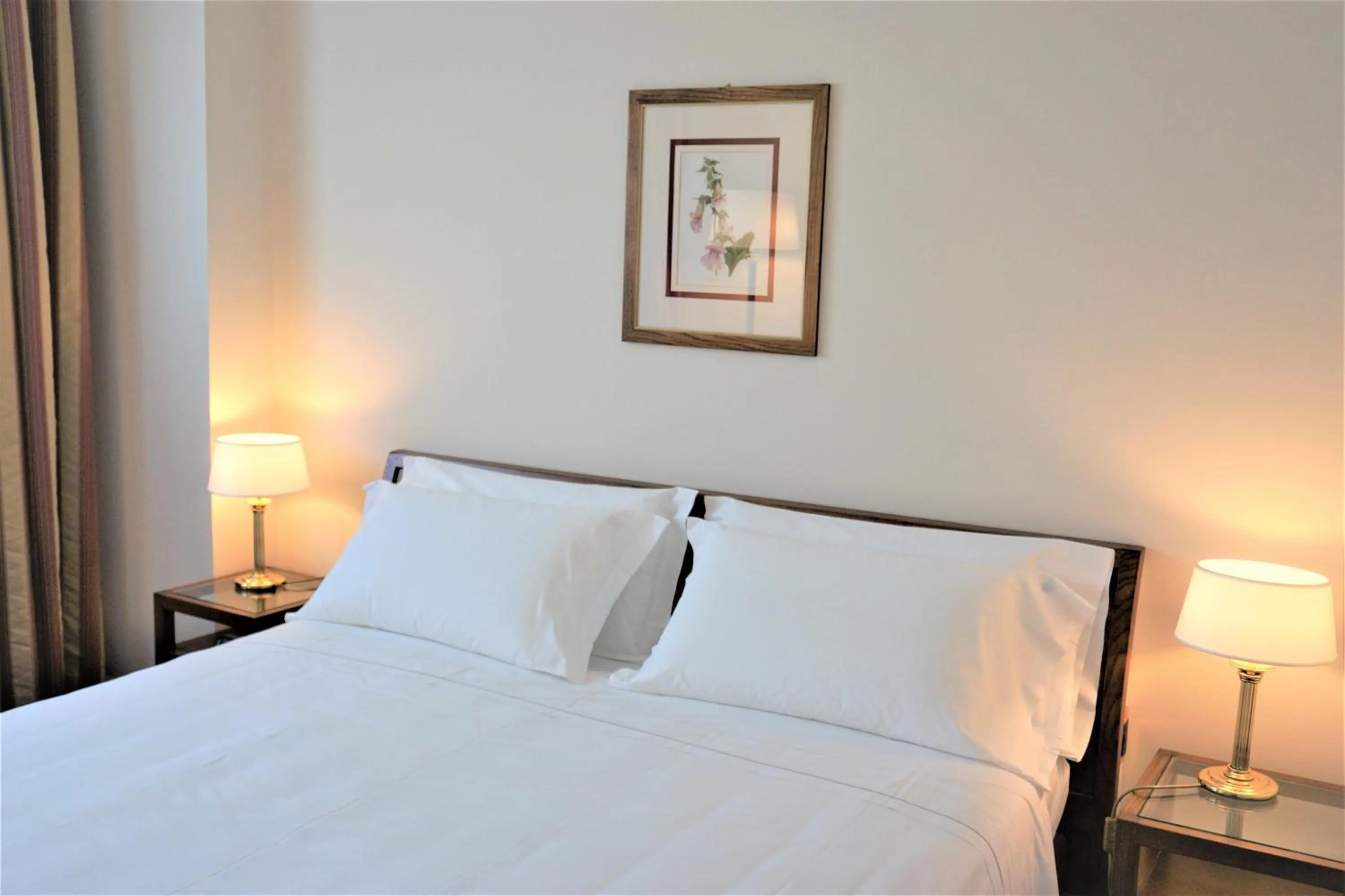 Bed in Delta Hotel Apartments