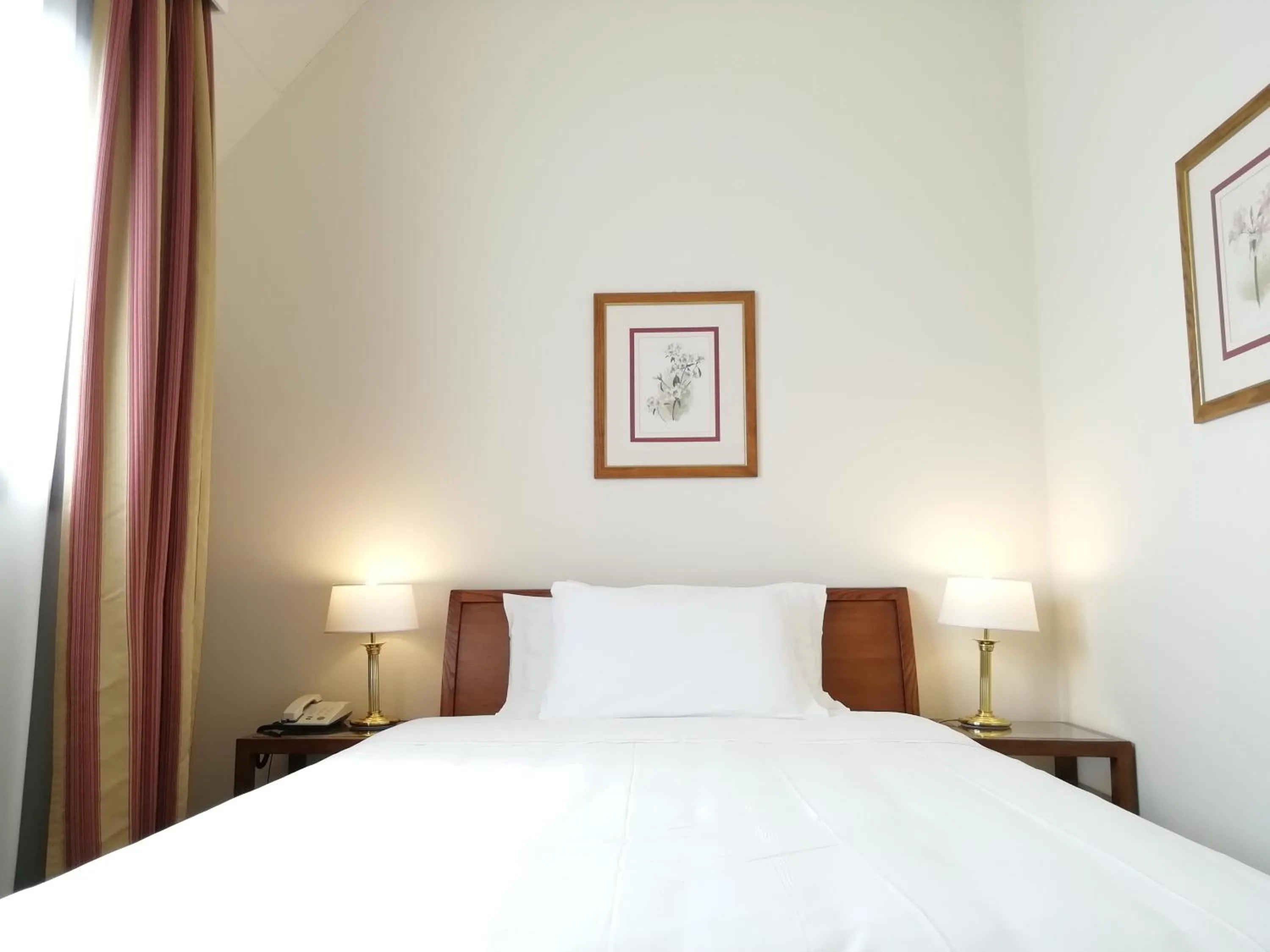 Bed in Delta Hotel Apartments