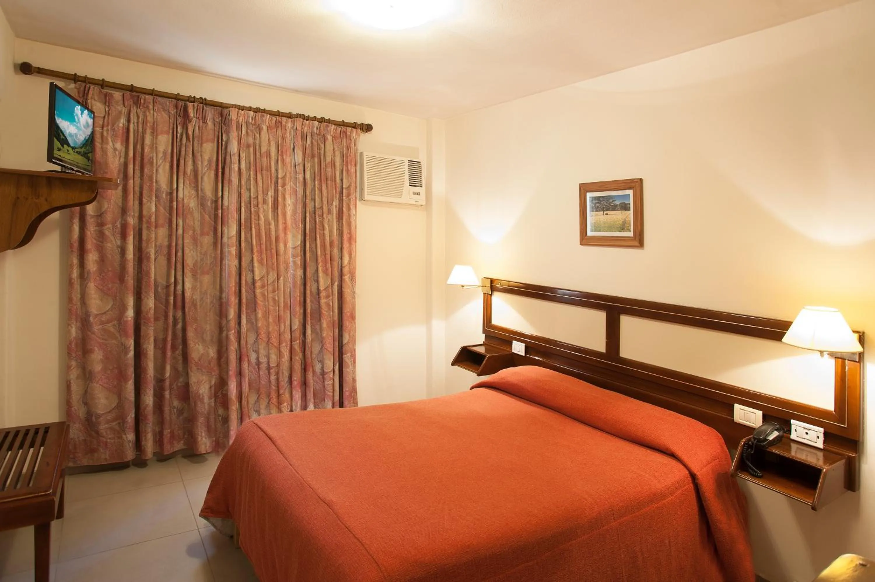 Bed in Hotel Carollo