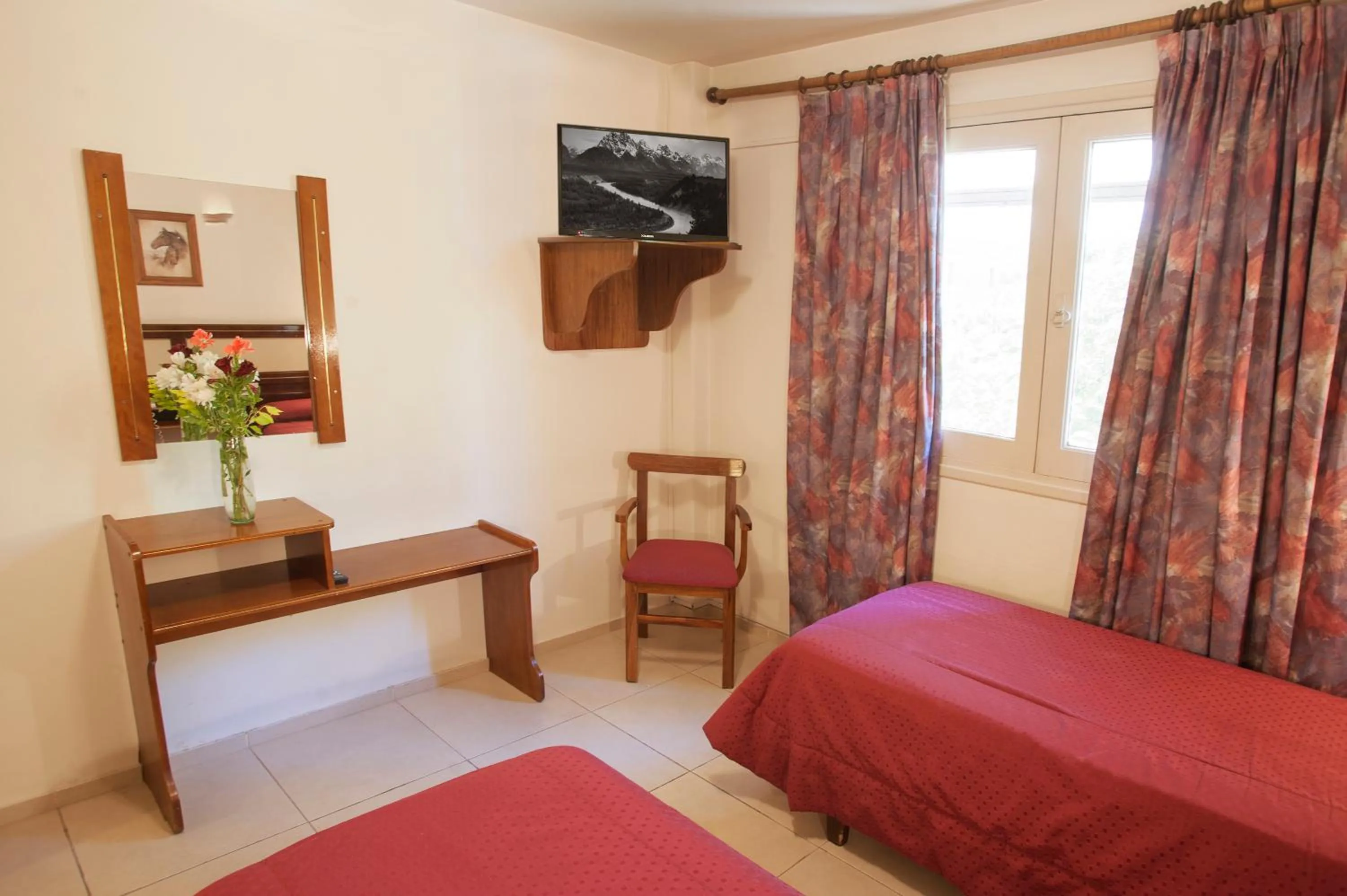 Bed in Hotel Carollo