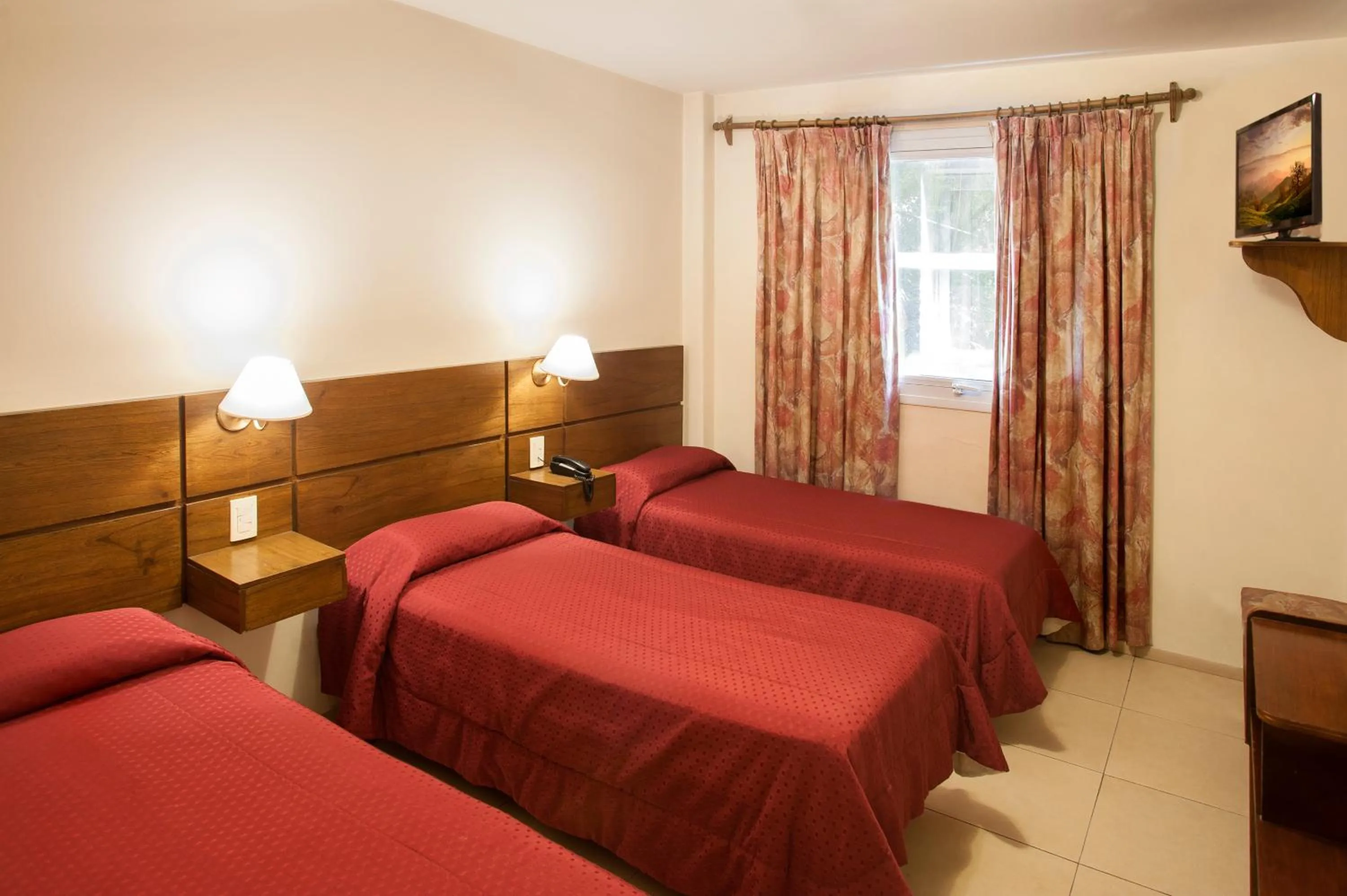 Bed in Hotel Carollo